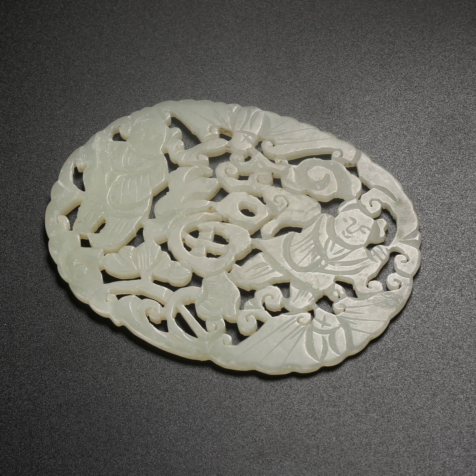 A HETIAN JADE PENDANT CARVED WITH THE HEHE TWINS MOTIF (1 of 8)