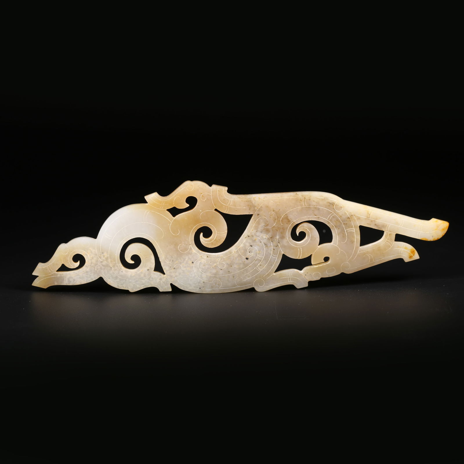 A ARCHAIC JADE S-SHAPED DRAGON PENDANT (1 of 8)