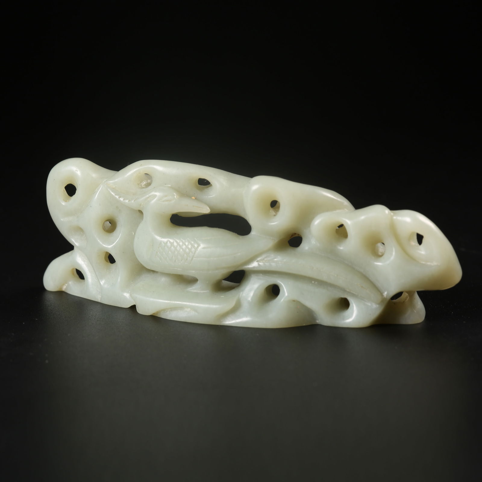 A HETIAN JADE BRUSH REST CARVED AS A PHOENIX-AND-MOUNTAIN SCENE (1 of 8)