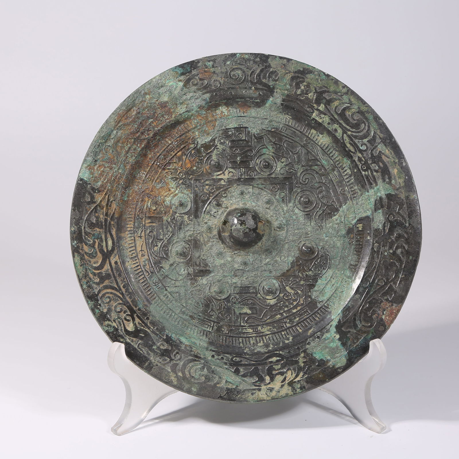 A PRE-HAN BRONZE MIRROR WITH AUSPICIOUS BEAST MOTIFS (1 of 9)