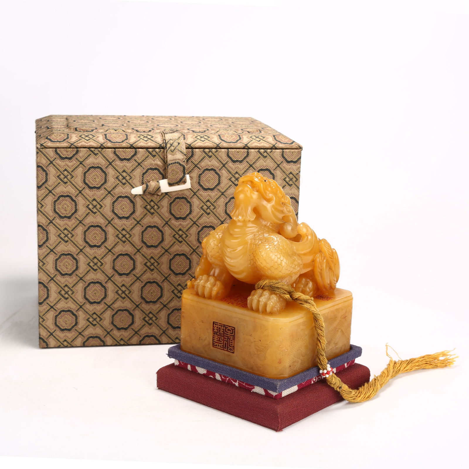 A SHOUSHAN TIANHUANG STONE SEAL WITH YINGLONG (WINGED DRAGON) KNOB: Shoushan Tianhuang Stone Seal with Yinglong (Winged Dragon) Knob