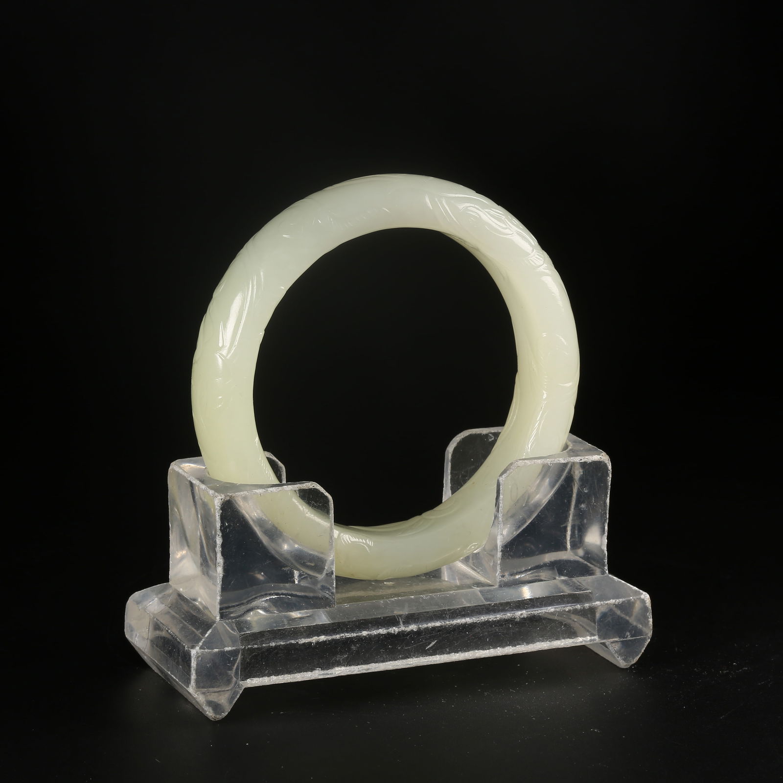 A HETIAN WHITE JADE BRACELET WITH DEER MOTIF (1 of 9)