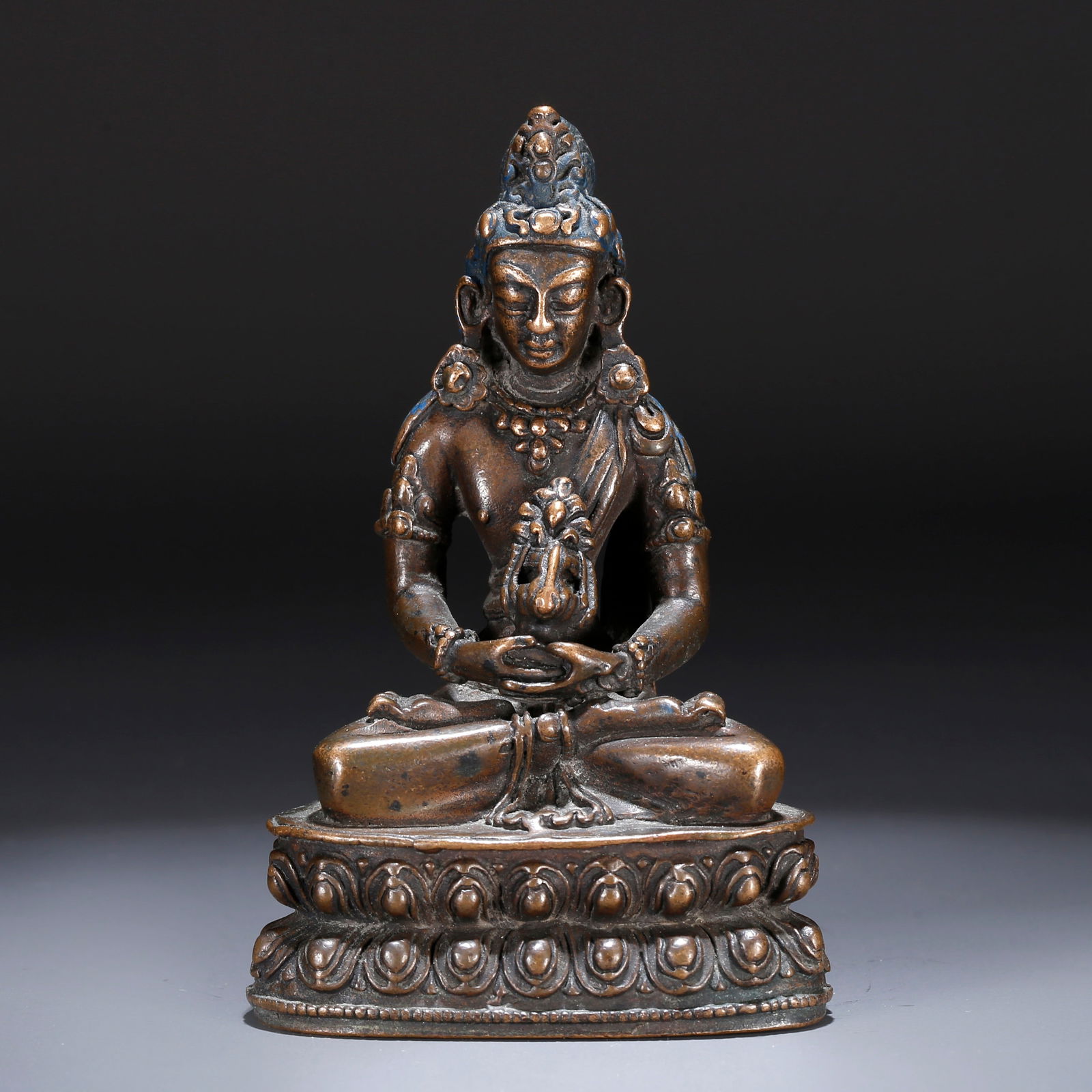 A BRONZE STATUE OF AMITAYUS (BUDDHA OF LONGEVITY) (1 of 10)