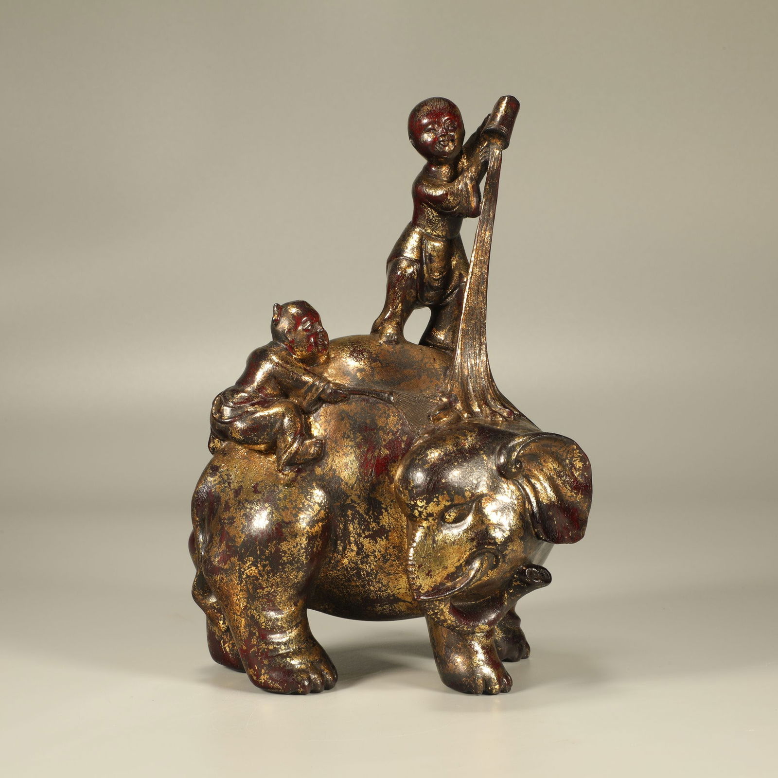 A ZITAN LACQUERED GILDED CARVED CHILD WASHING ELEPHANT ORNAMENT (1 of 6)