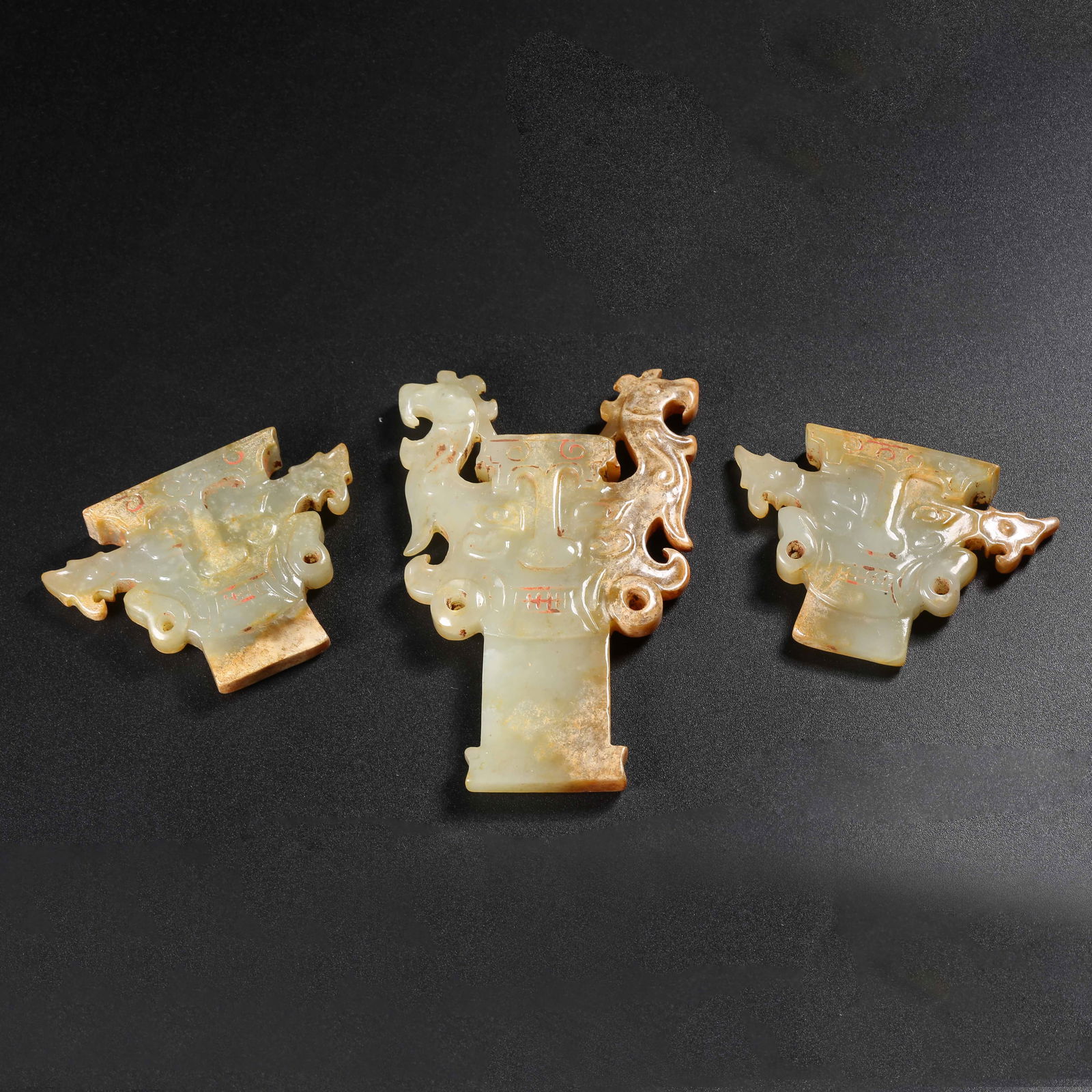 A SET OF ANCIENT JADE MASKS OF DEITIES (1 of 9)