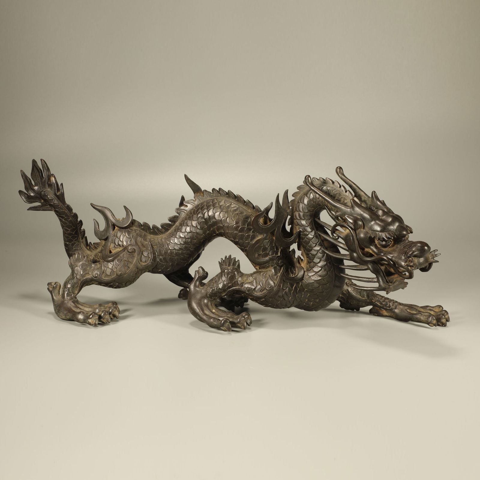 A BRONZE DRAGON ORNAMENT (1 of 7)