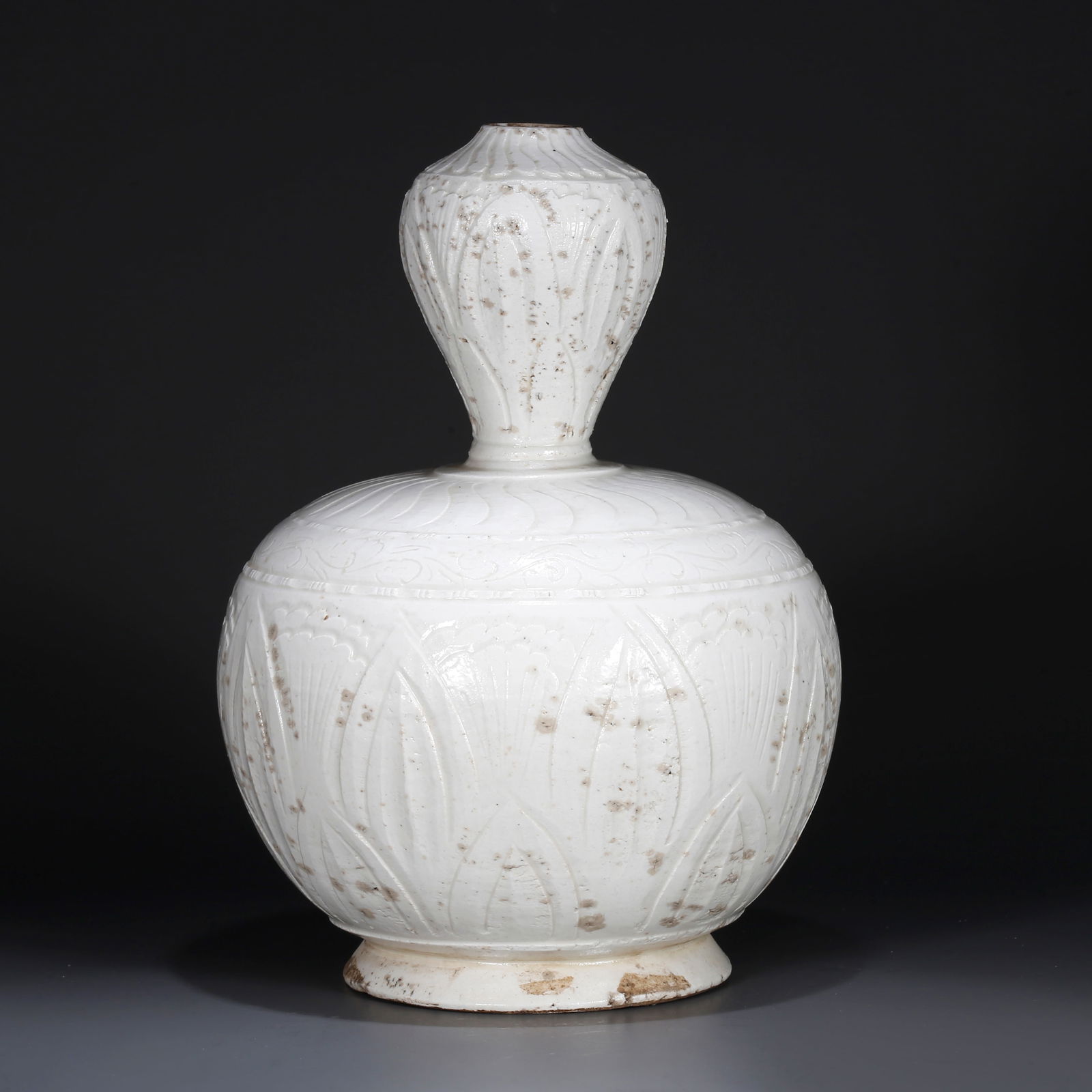 A DING KILN APPRECIATION VASE (1 of 10)
