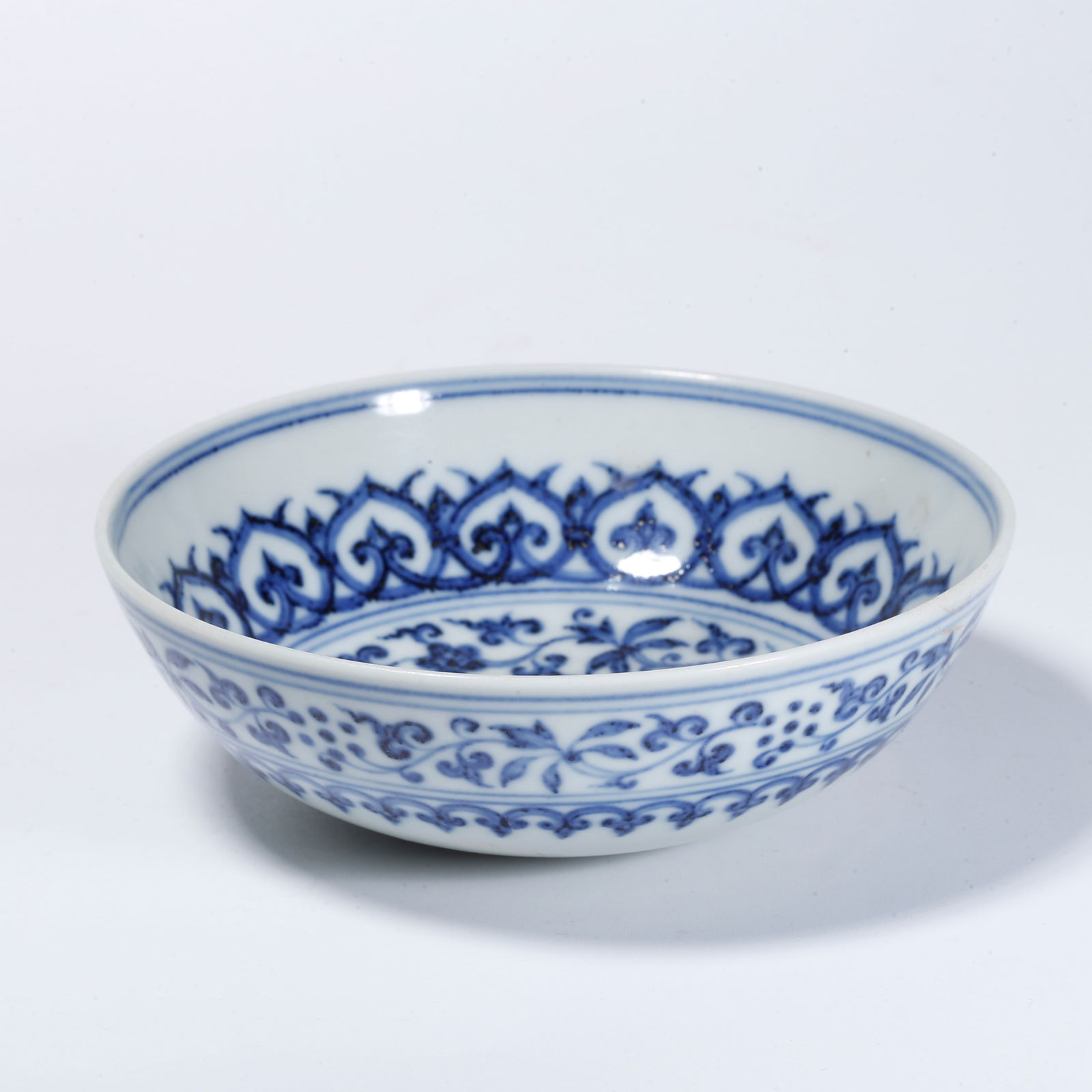A BLUE-AND-WHITE PLATE WITH FLORAL DESIGN (1 of 11)