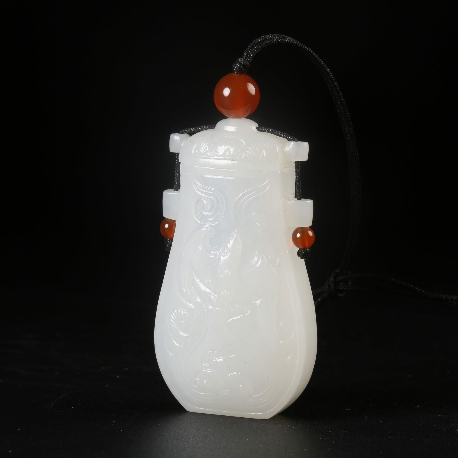 A HETIAN WHITE JADE SACHET WITH DIVINE PHOENIX MOTIF (1 of 8)