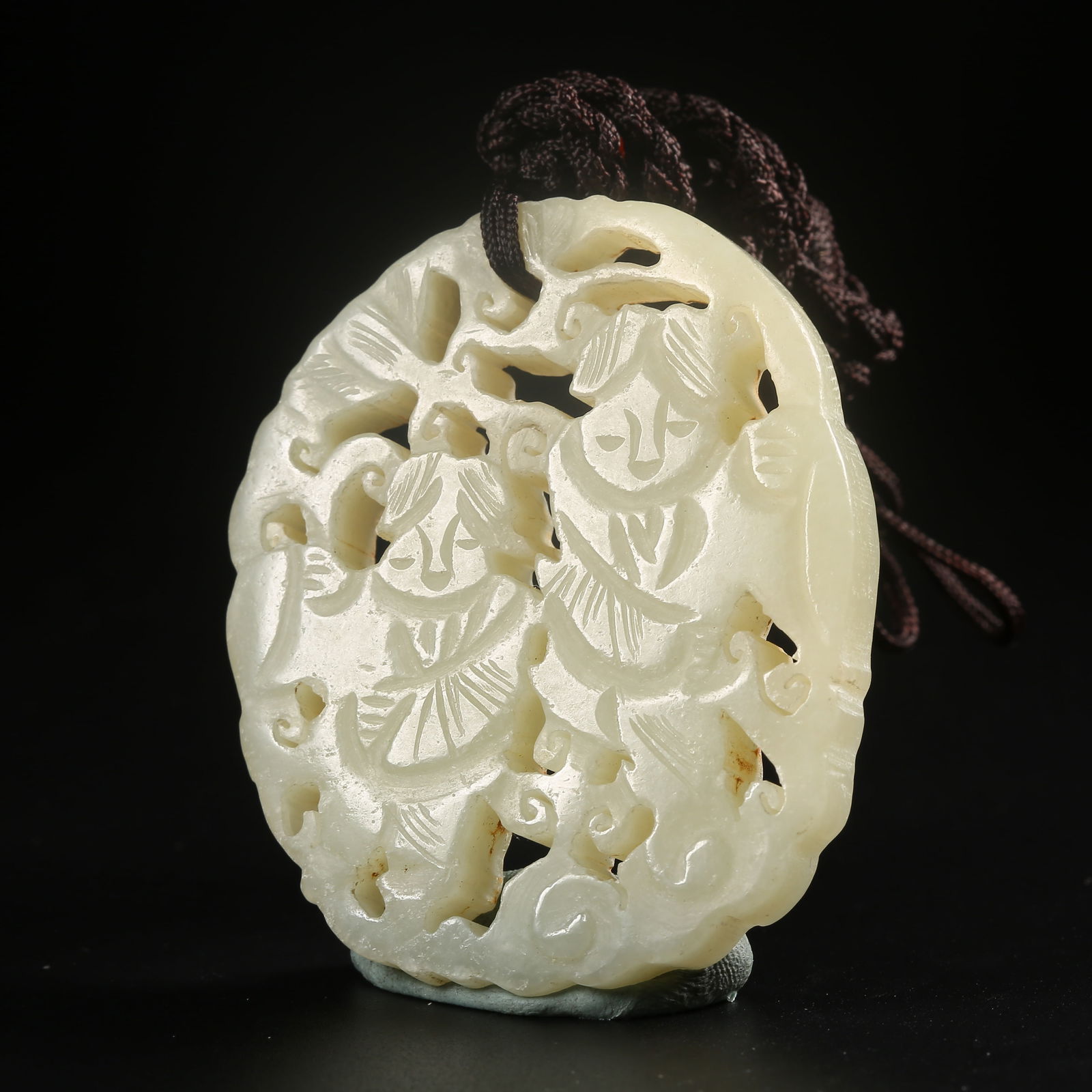 A HETIAN JADE PLAQUE CARVED WITH THE HEHE TWINS MOTIF (1 of 8)