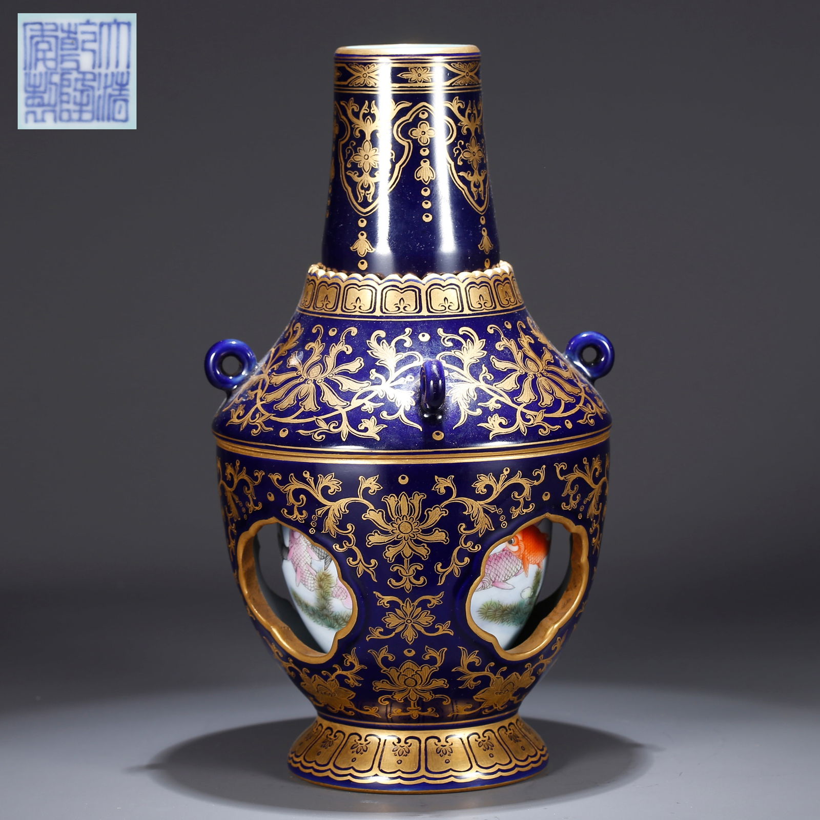 A BLUE GLAZE REVOLVING VASE WITH GOLD DECORATION (1 of 10)