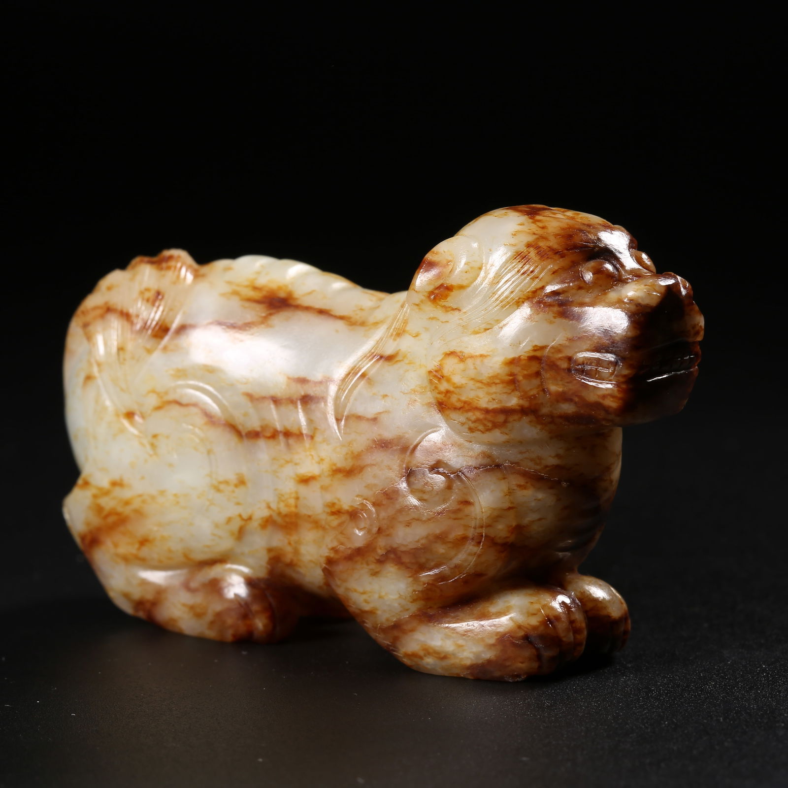 A ANCIENT JADE AUSPICIOUS BEAST HANDHELD ORNAMENT (1 of 8)