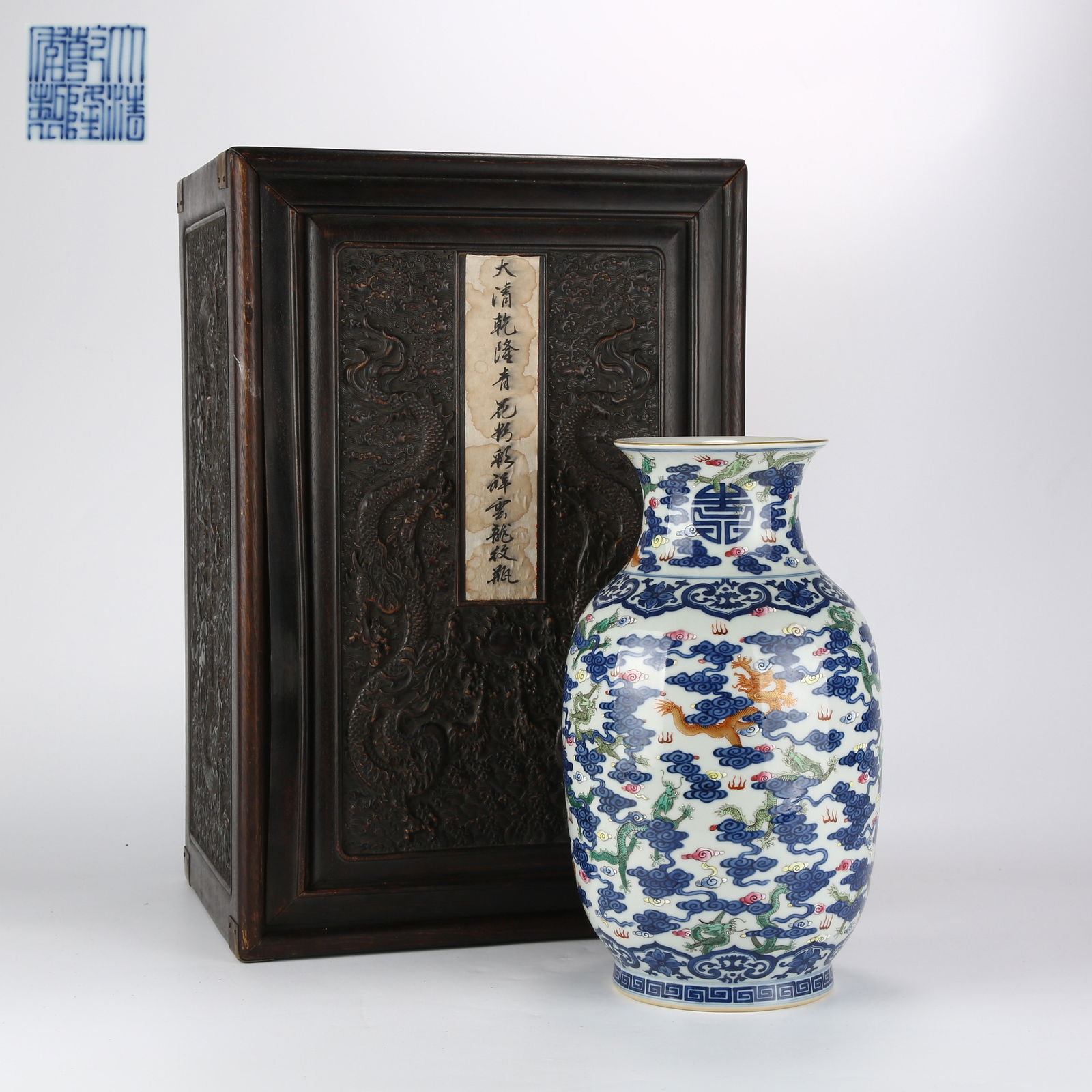 A FAMILLE-ROSE VASE WITH CLOUD AND DRAGON PATTERN: Famille-Rose Vase with Cloud and Dragon Pattern