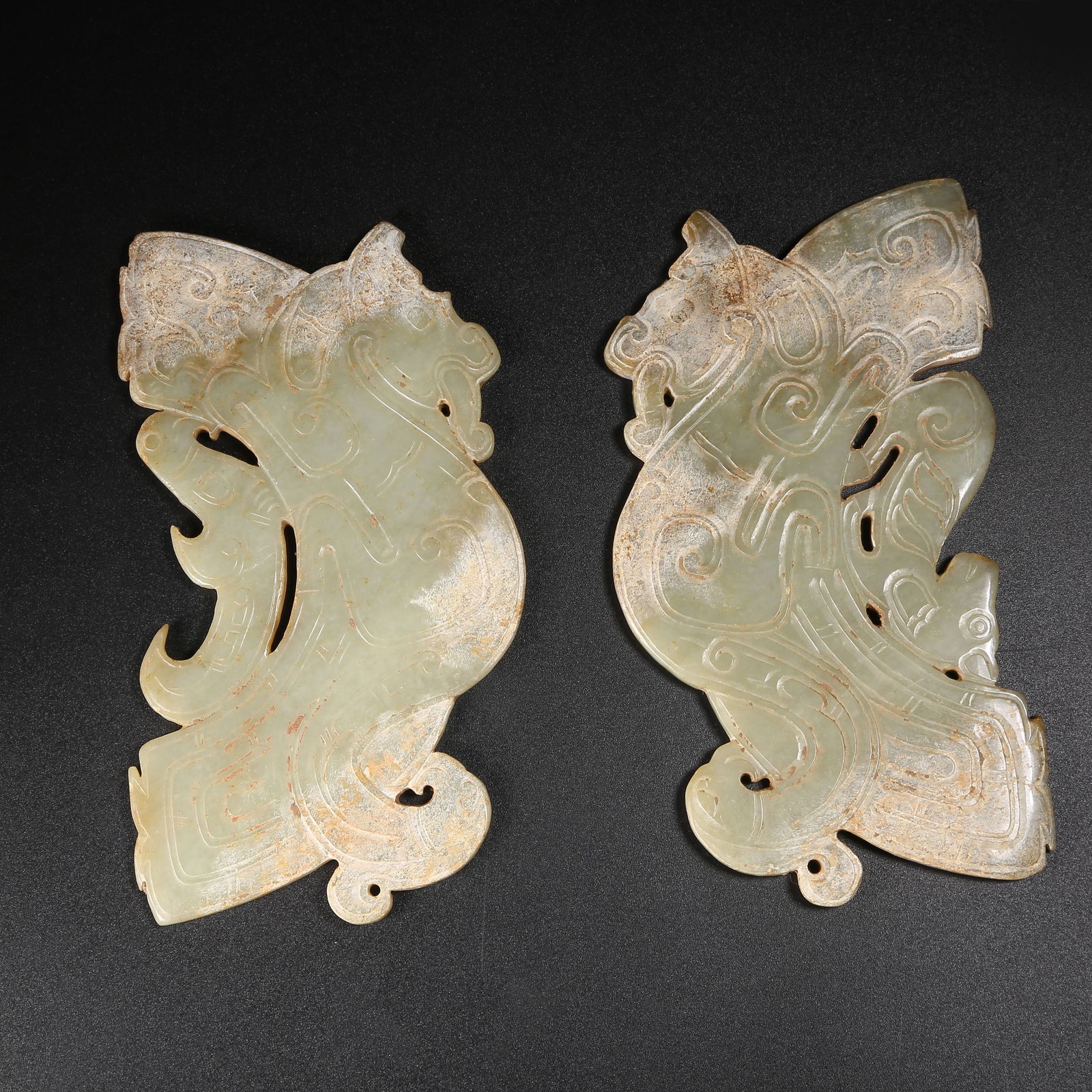 A SET OF ARCHAIC JADE HUANG WITH DRAGON AND PHOENIX SHAPES (1 of 7)