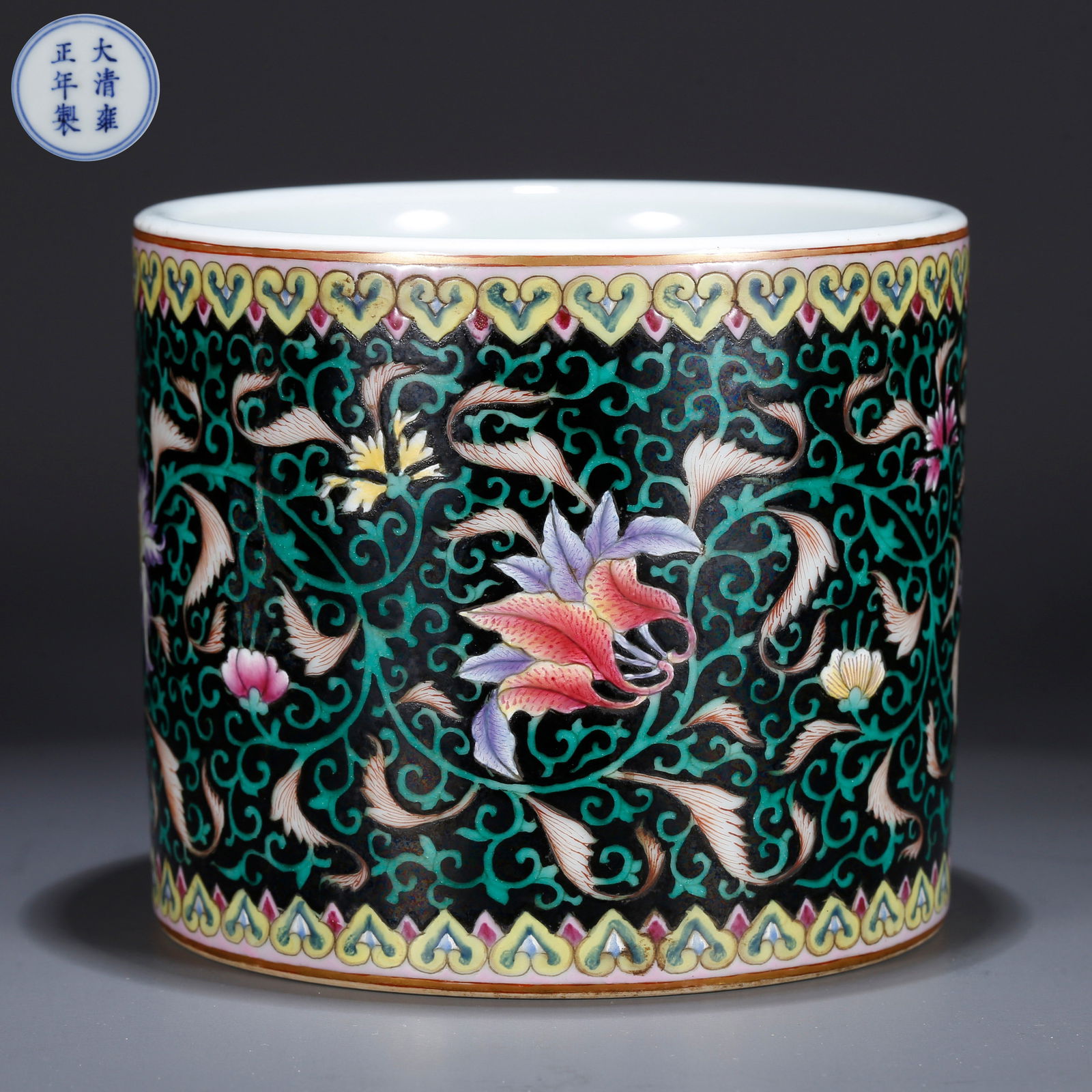 A BLACK-GROUND GREEN-ENAMEL BRUSH POT WITH FLORAL DESIGN (1 of 9)