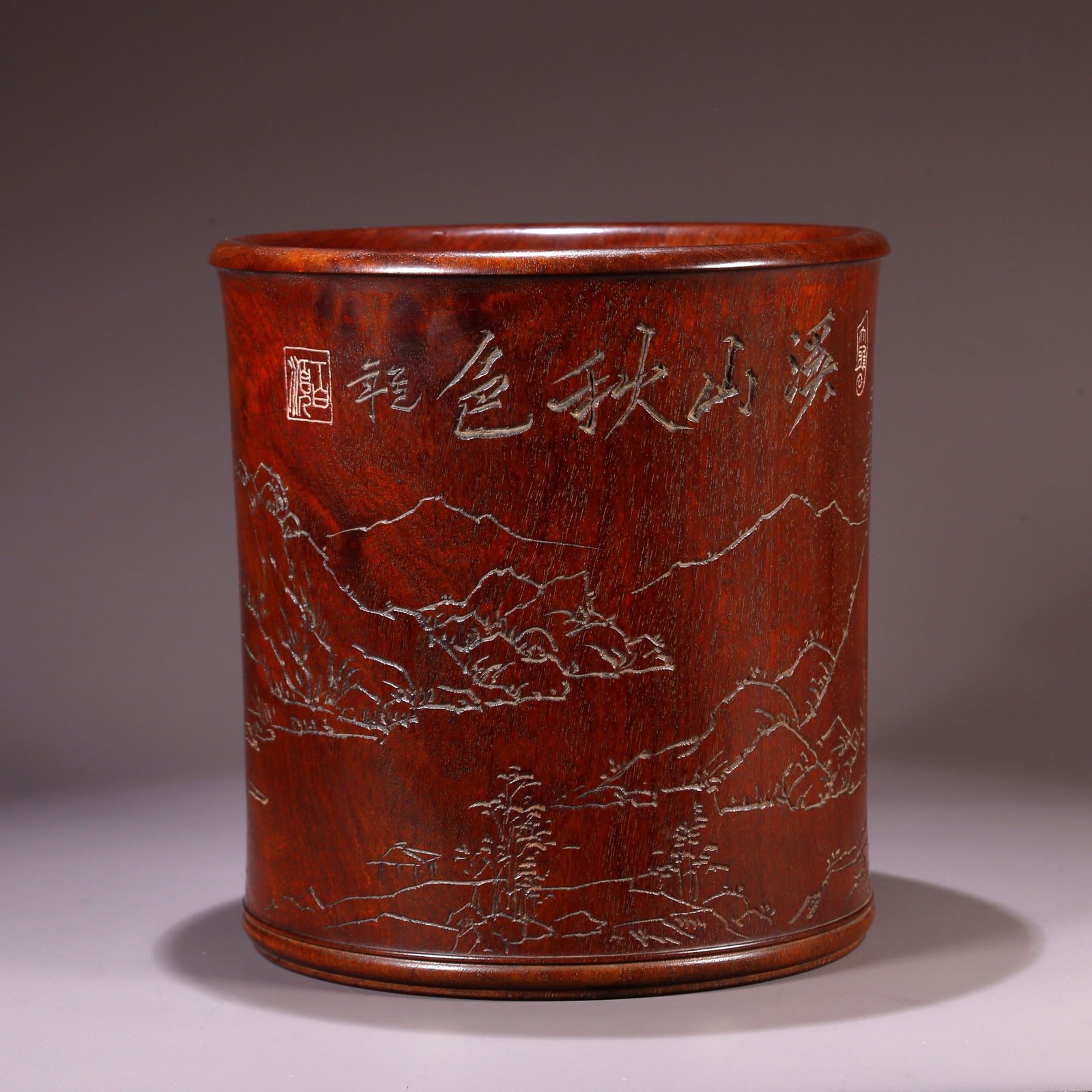 A HUANGHUALI BRUSH POT CARVED WITH LANDSCAPE DESIGN: Huanghuali Brush Pot Carved with Landscape Design