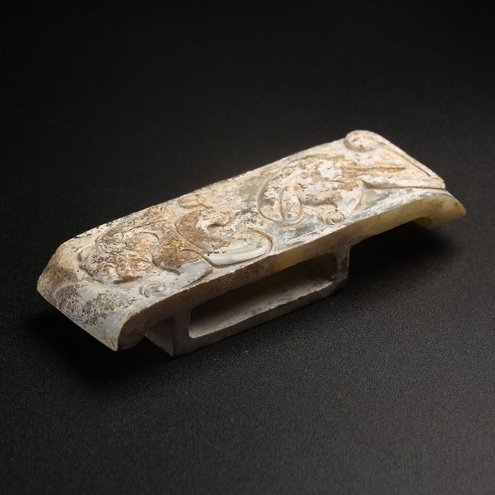 A ARCHAIC JADE SWORD-PIG WITH CHI-DRAGON MOTIF (1 of 9)