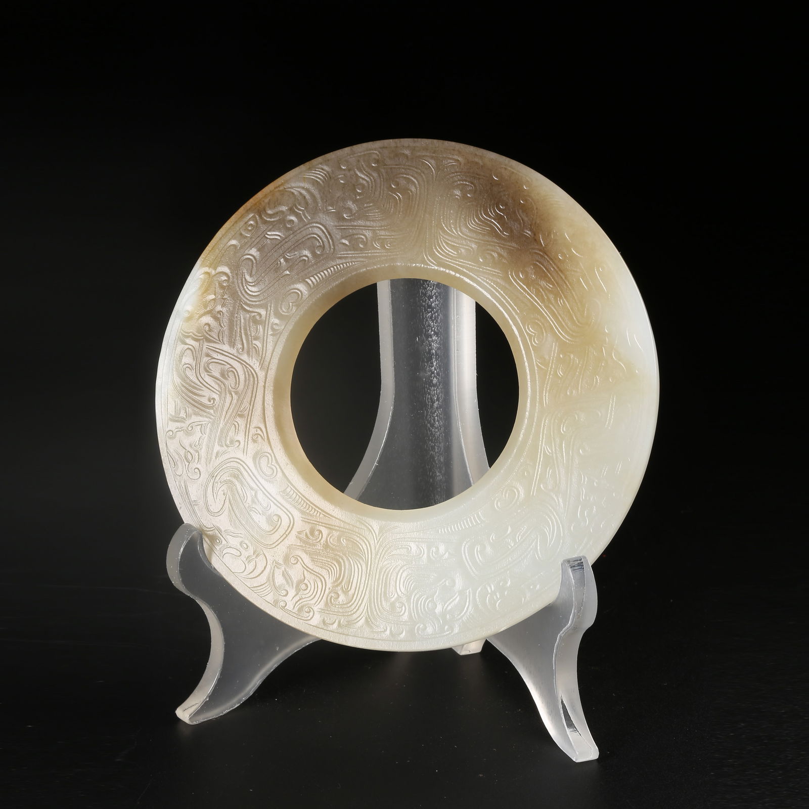 A ARCHAIC JADE BI DISK WITH AUSPICIOUS BEAST MOTIF (1 of 10)