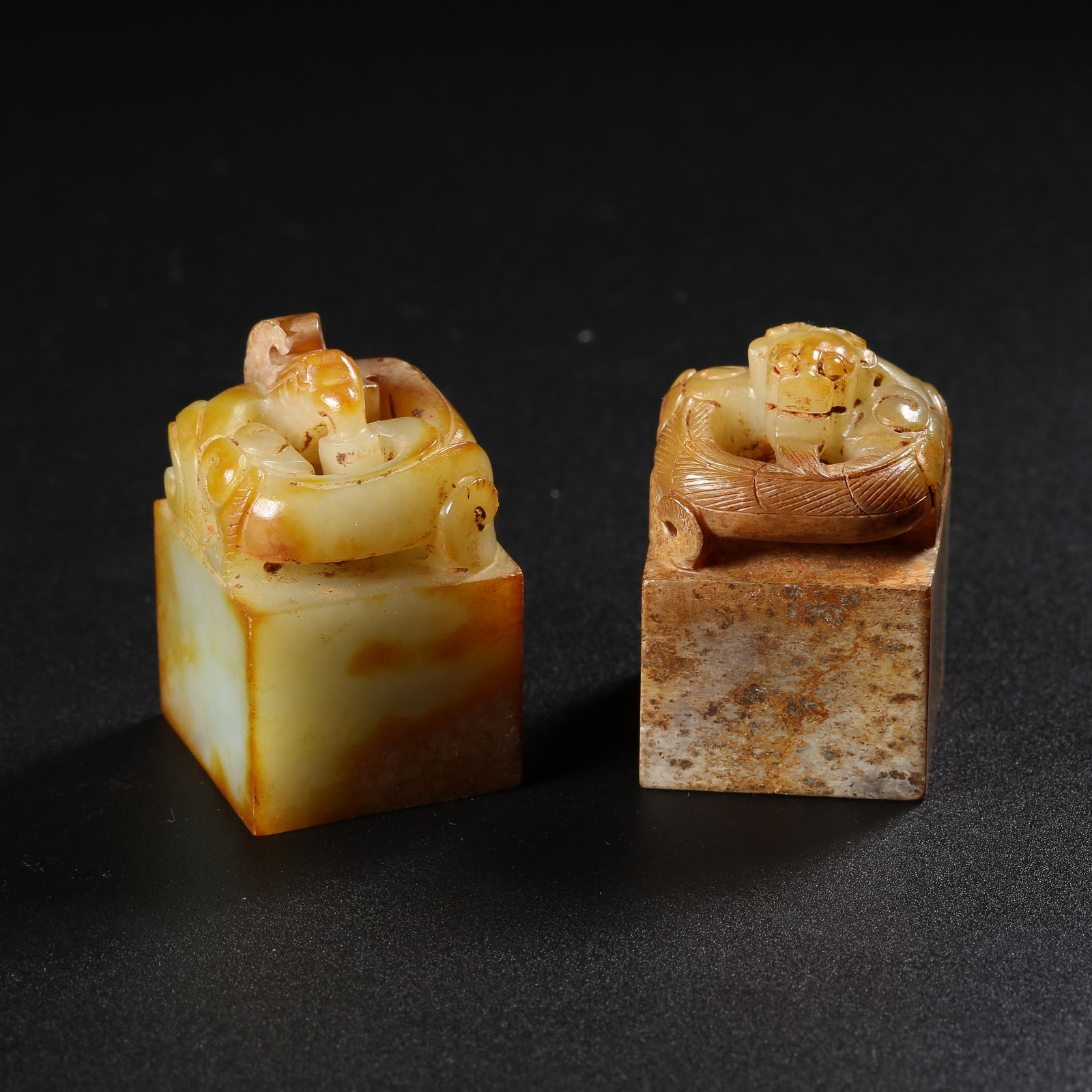 A SET OF ANCIENT JADE SEALS WITH DRAGON AND PHOENIX KNOBS (1 of 10)