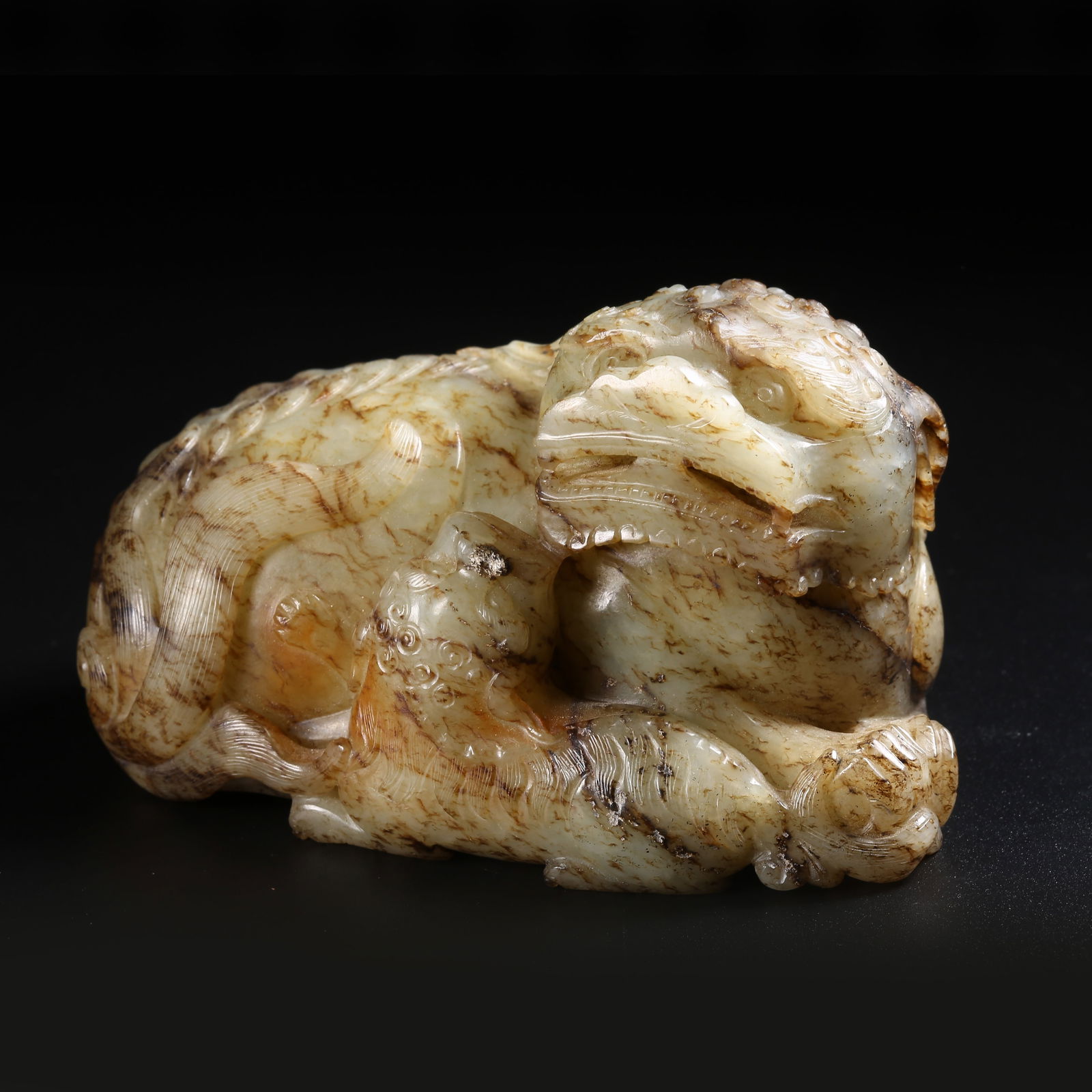 A ARCHAIC JADE AUSPICIOUS BEAST ORNAMENT (1 of 8)