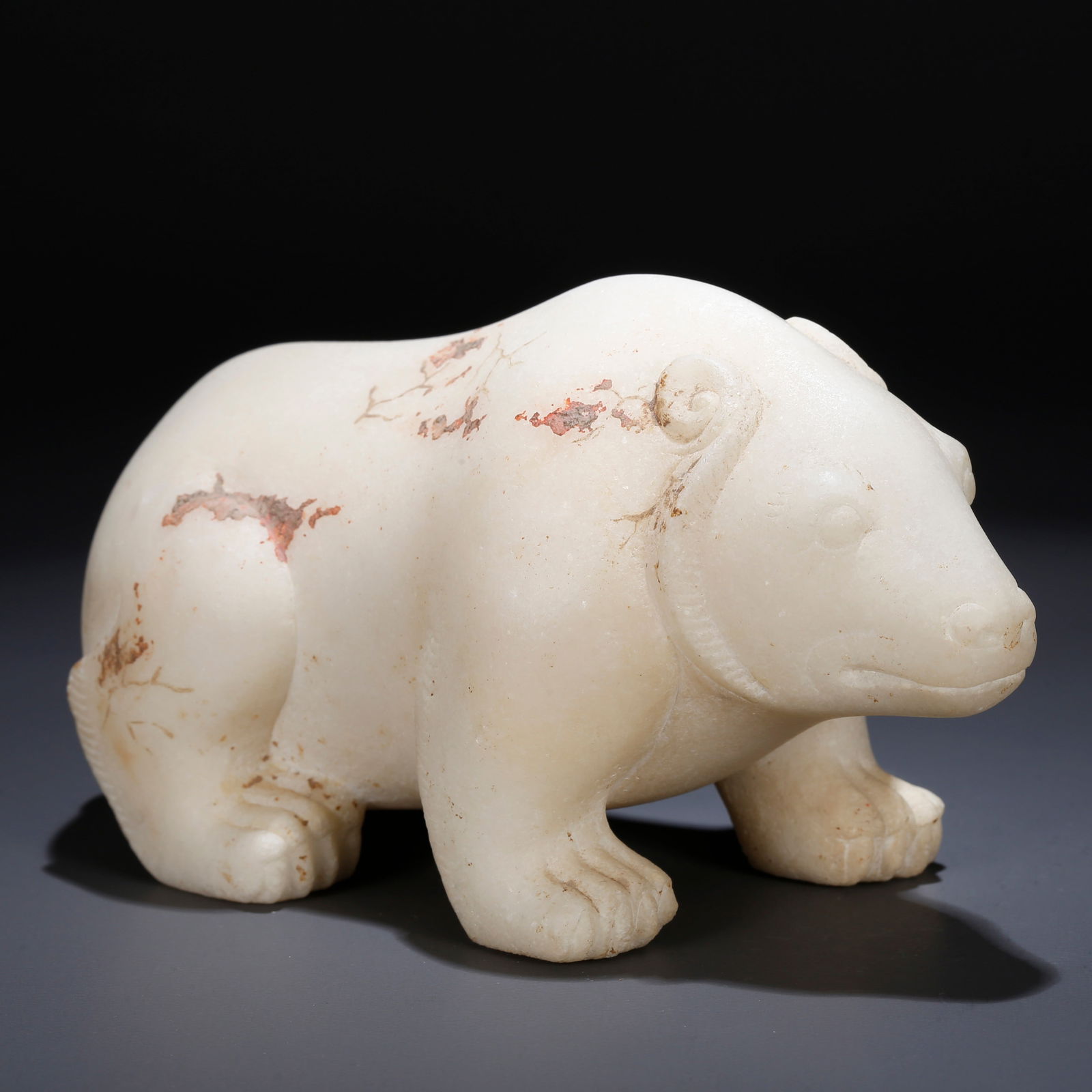 A HAN WHITE JADE BEAR ORNAMENT (1 of 9)