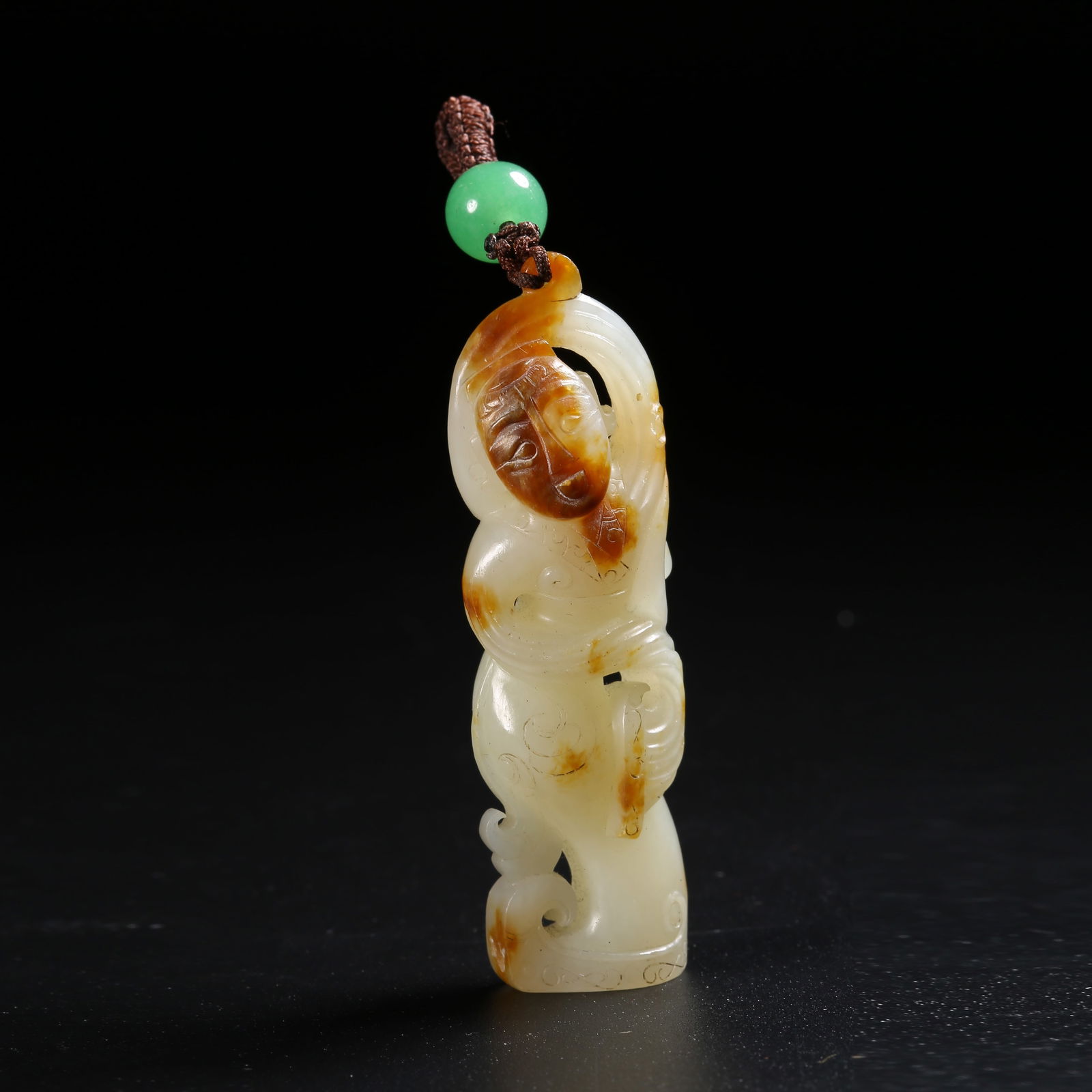 A HETIAN JADE DANCER PENDANT (1 of 8)