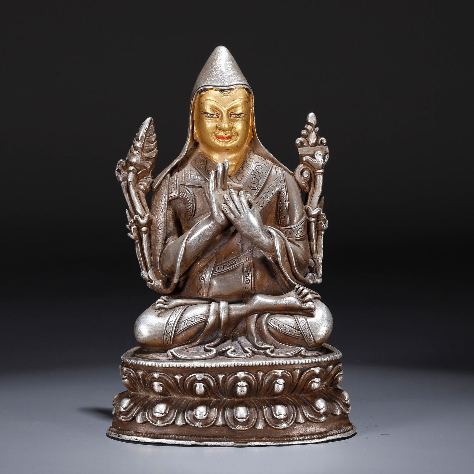 A GILT SILVER STATUE OF A LAMA (1 of 10)