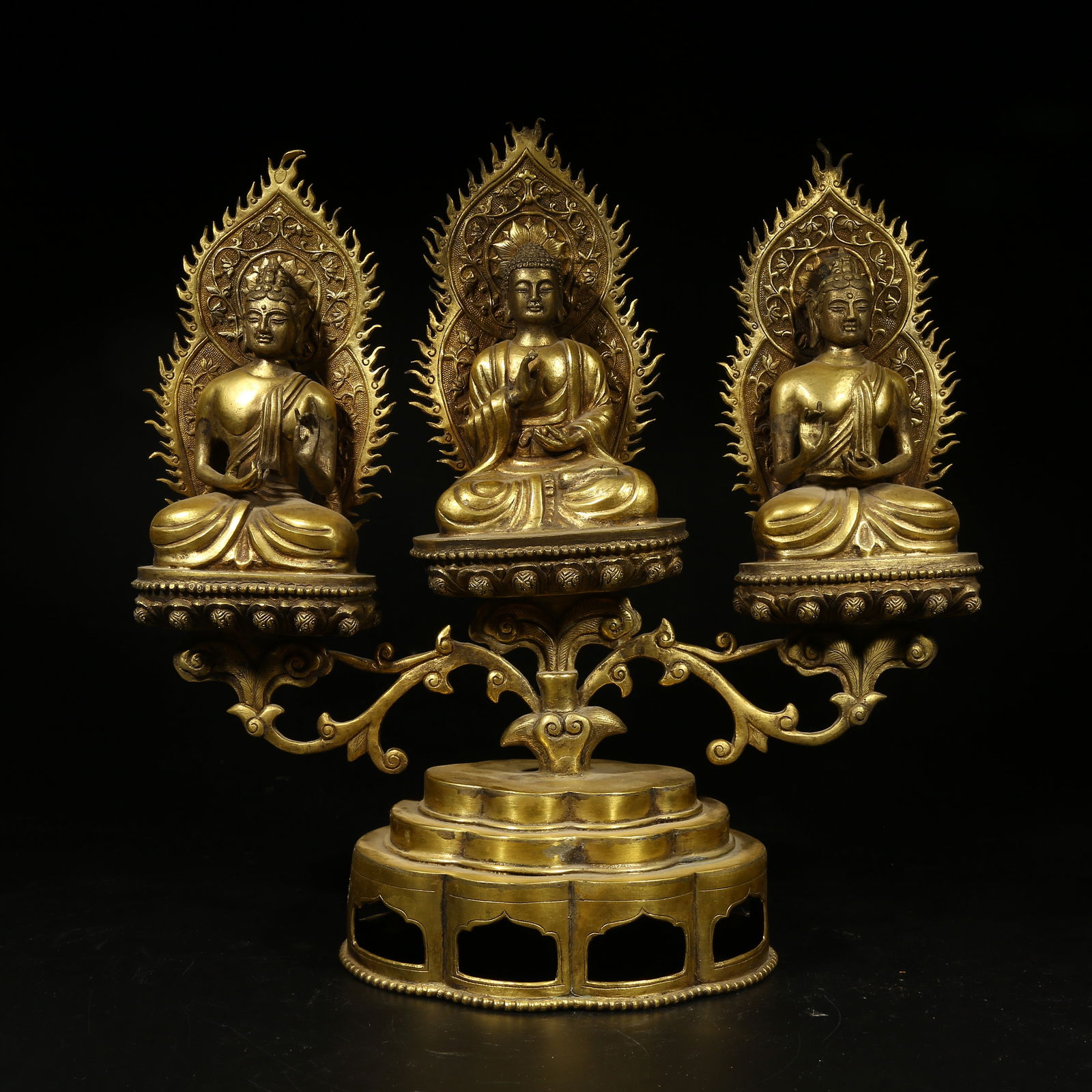 A GILT-BRONZE FIGURES OF THE THREE BUDDHAS (1 of 9)