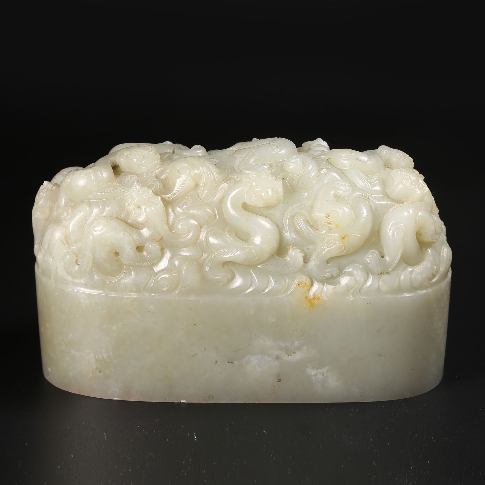 A HETIAN JADE SEAL WITH DRAGON MOTIFS (1 of 8)