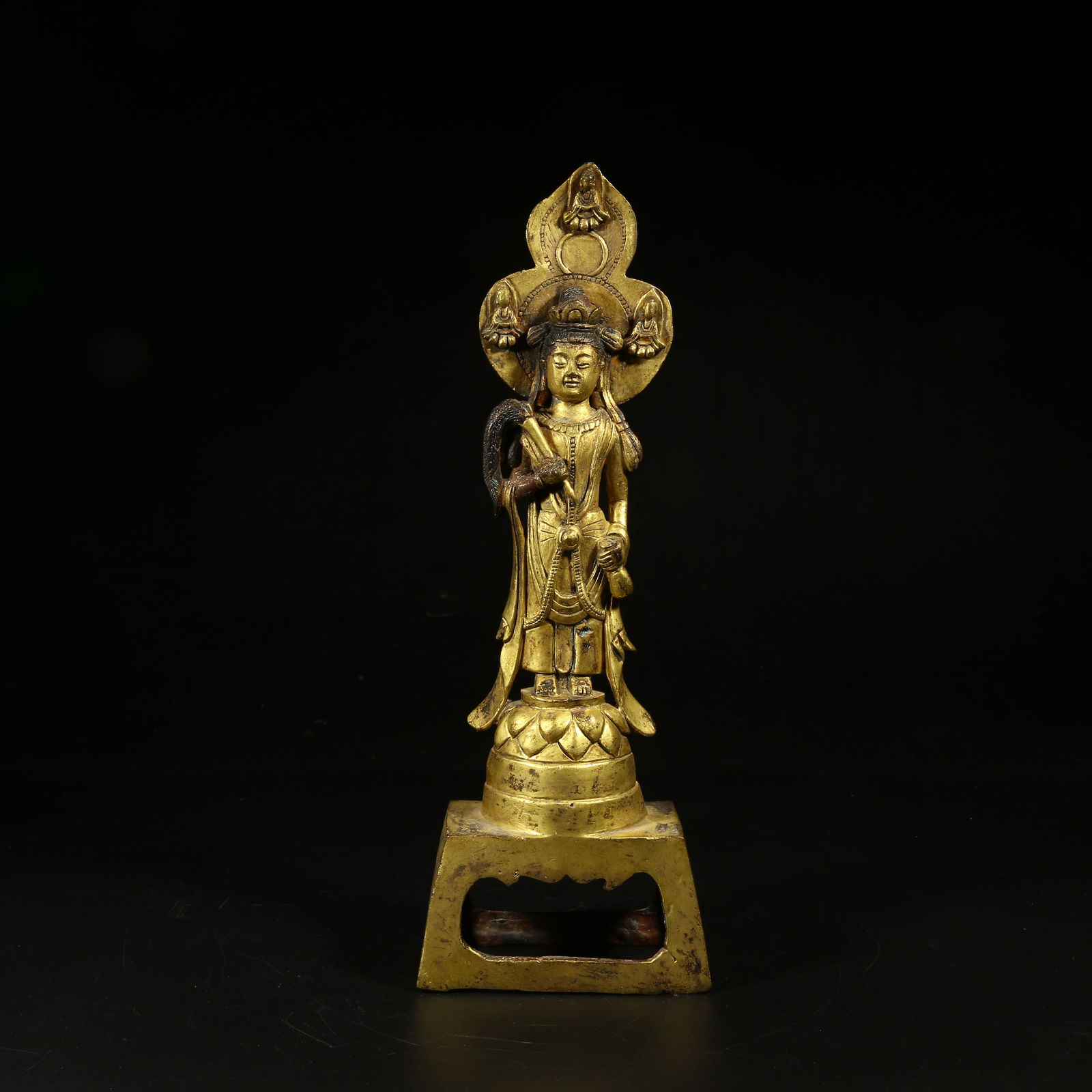 A GILT-BRONZE STANDING FIGURE OF GUANYIN: Gilt-Bronze Standing Figure of Guanyin