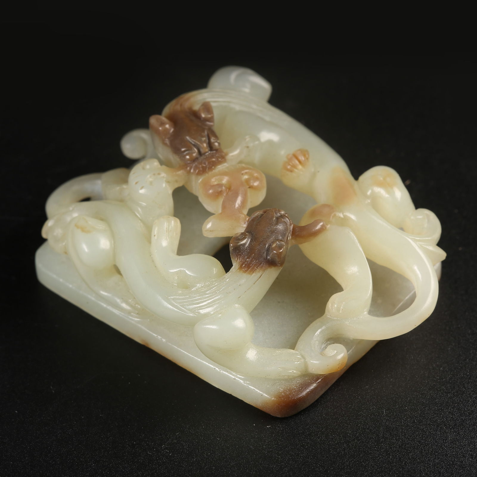 A ARCHAIC JADE BELT HOOK WITH CHI-DRAGON MOTIF (1 of 9)