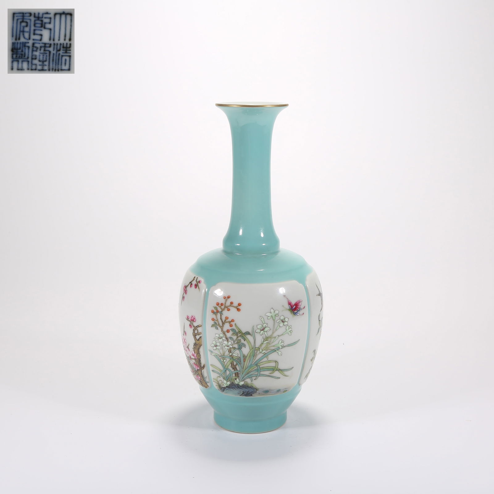 A TURQUOISE-GROUND ROULEAU VASE WITH RESERVED FAMILLE-ROSE FLOWER-AND-BUTTERFLY PANELS: Turquoise-ground rouleau vase with reserved famille-rose flower-and-butterfly panels