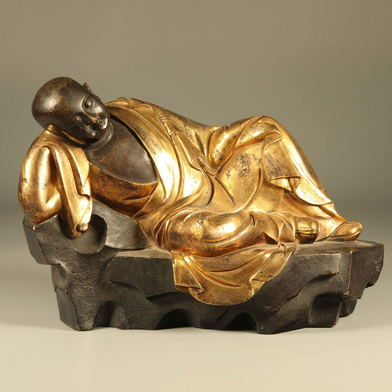 A GILT-BRONZE ARHAT STATUE: Gilt-Bronze Arhat Statue