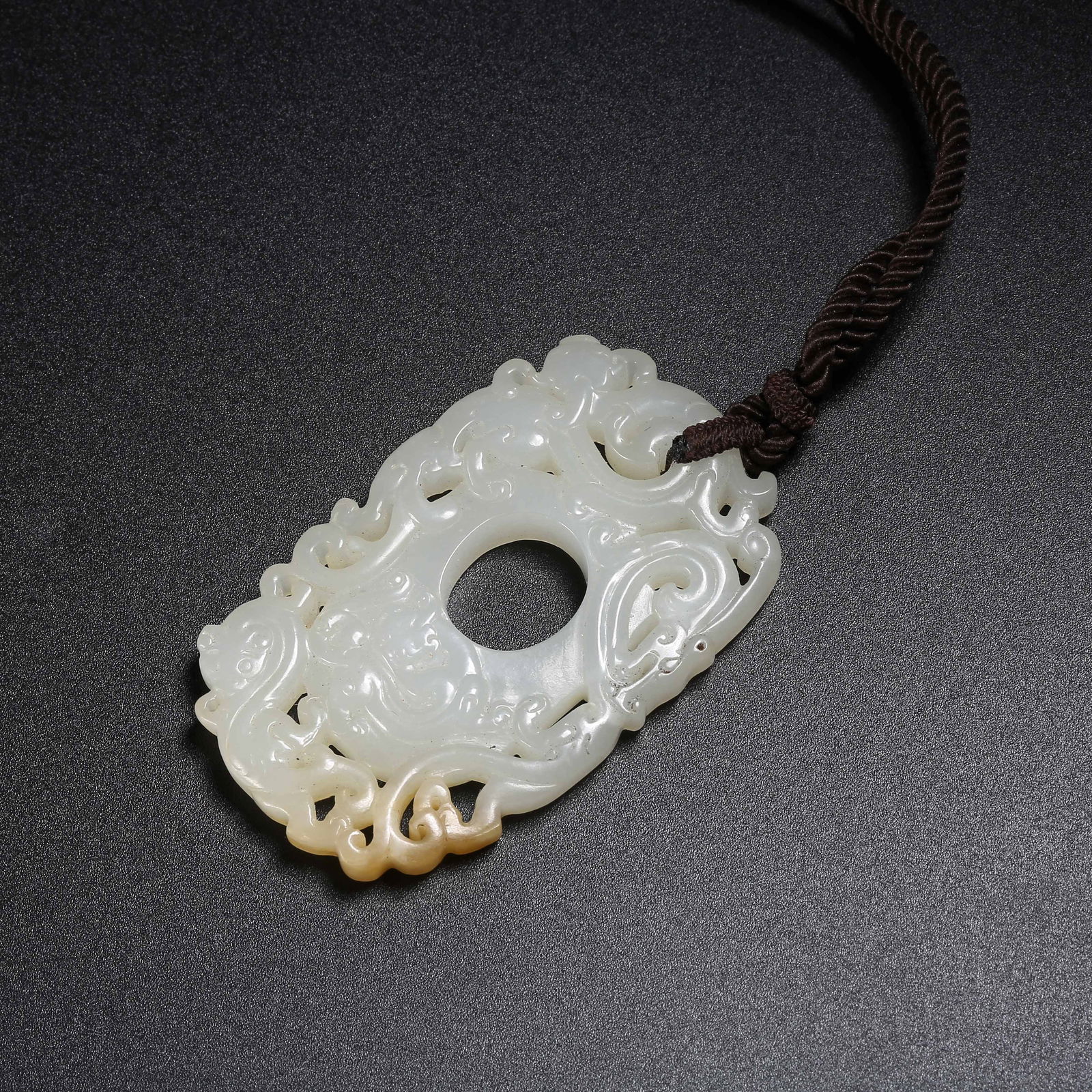 A HETIAN JADE DRAGON PENDANT (1 of 8)