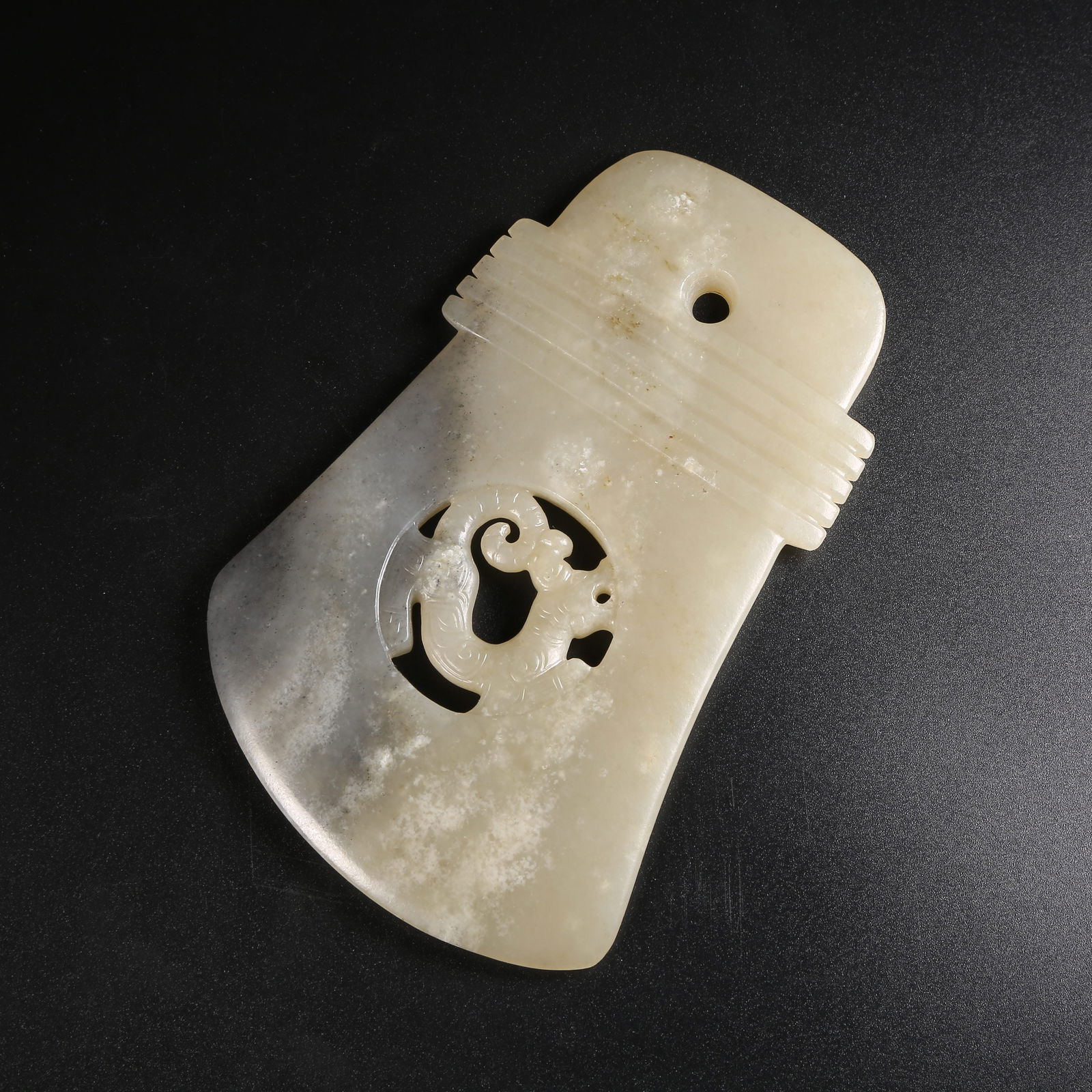 A HETIAN JADE AXE WITH DRAGON MOTIFS (1 of 9)