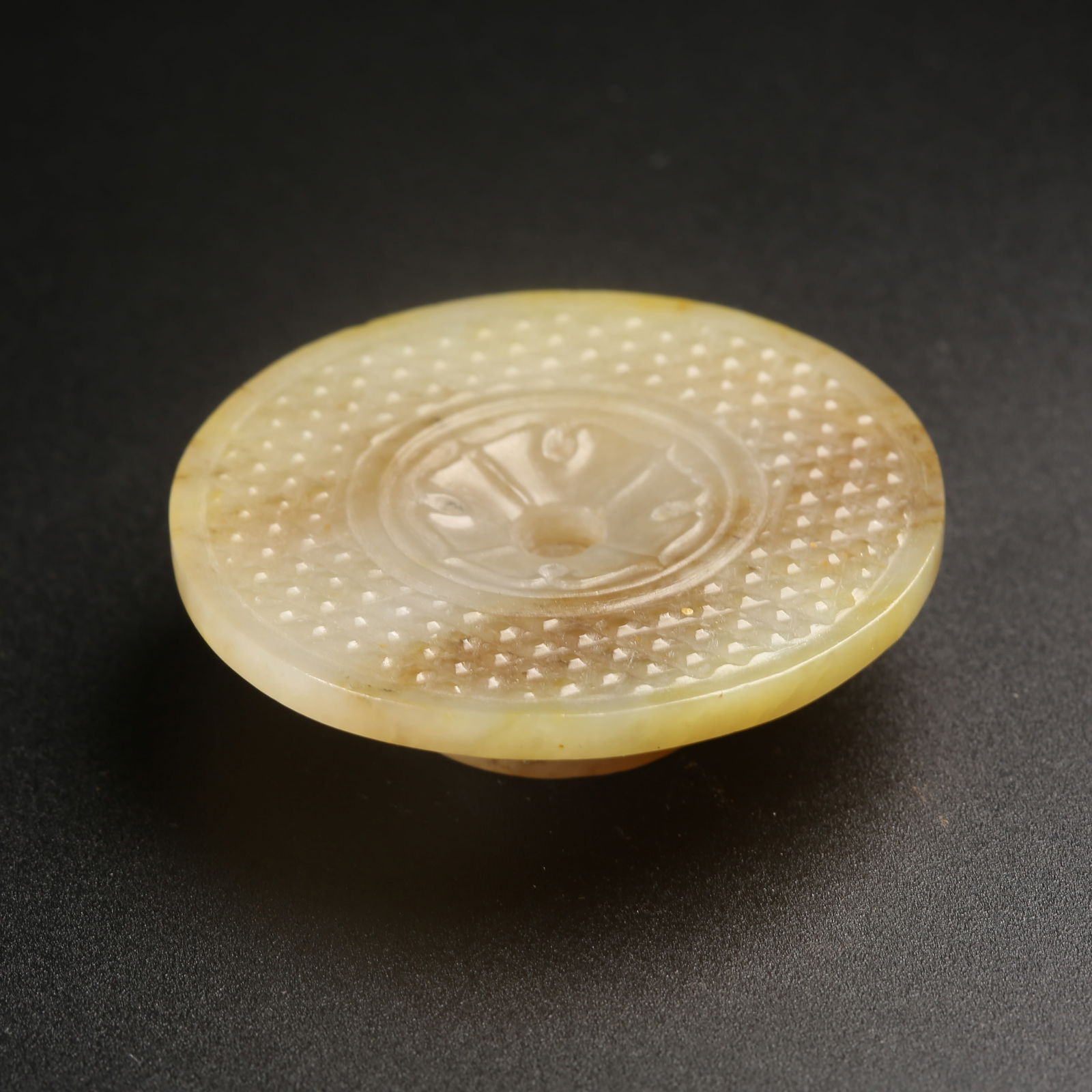 A ARCHAIC JADE RING-SHAPED OBJECT (1 of 8)