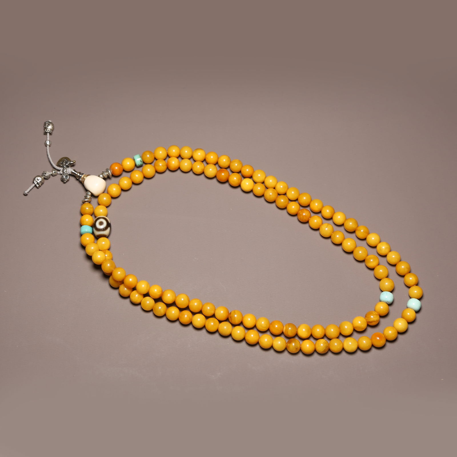 A STRAND OF BEESWAX PRAYER BEADS: One Strand of Beeswax Prayer Beads