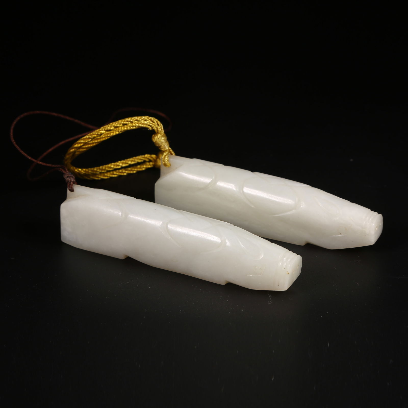 A SET OF HETIAN JADE HAND-HELD ORNAMENTS (1 of 8)