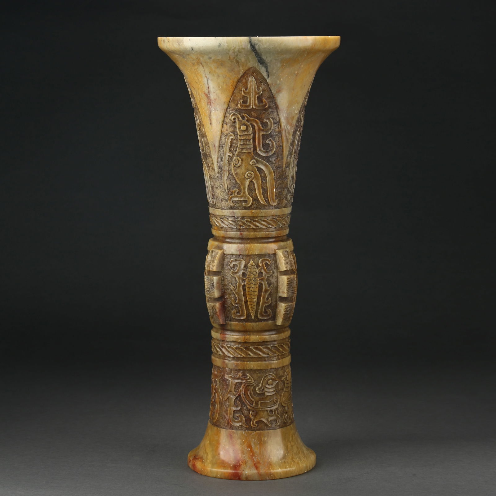 A SHOUSHAN STONE FANGHU VASE WITH CELESTIAL ROOSTER MOTIF AND FLARED PRONGS: Shoushan stone fanghu vase with celestial rooster motif and flared prongs