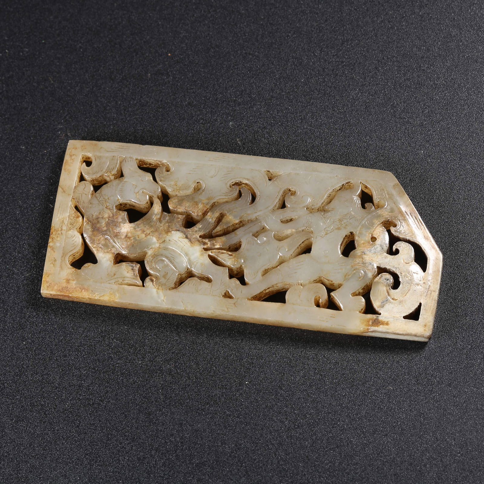 A ANCIENT JADE SWORD FITTING WITH AUSPICIOUS BEAST DESIGN (1 of 9)