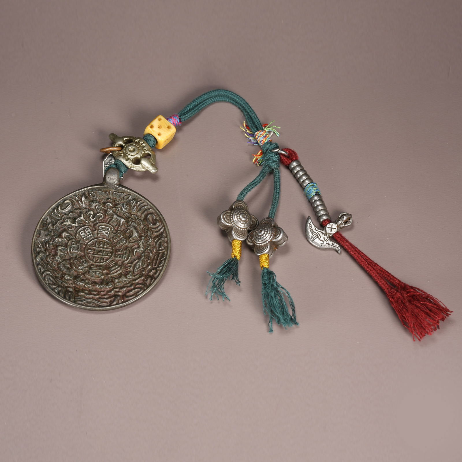 A BRONZE NINE-PALACE EIGHT-TRIGRAMS PLAQUE: Bronze Nine-Palace Eight-Trigrams Plaque