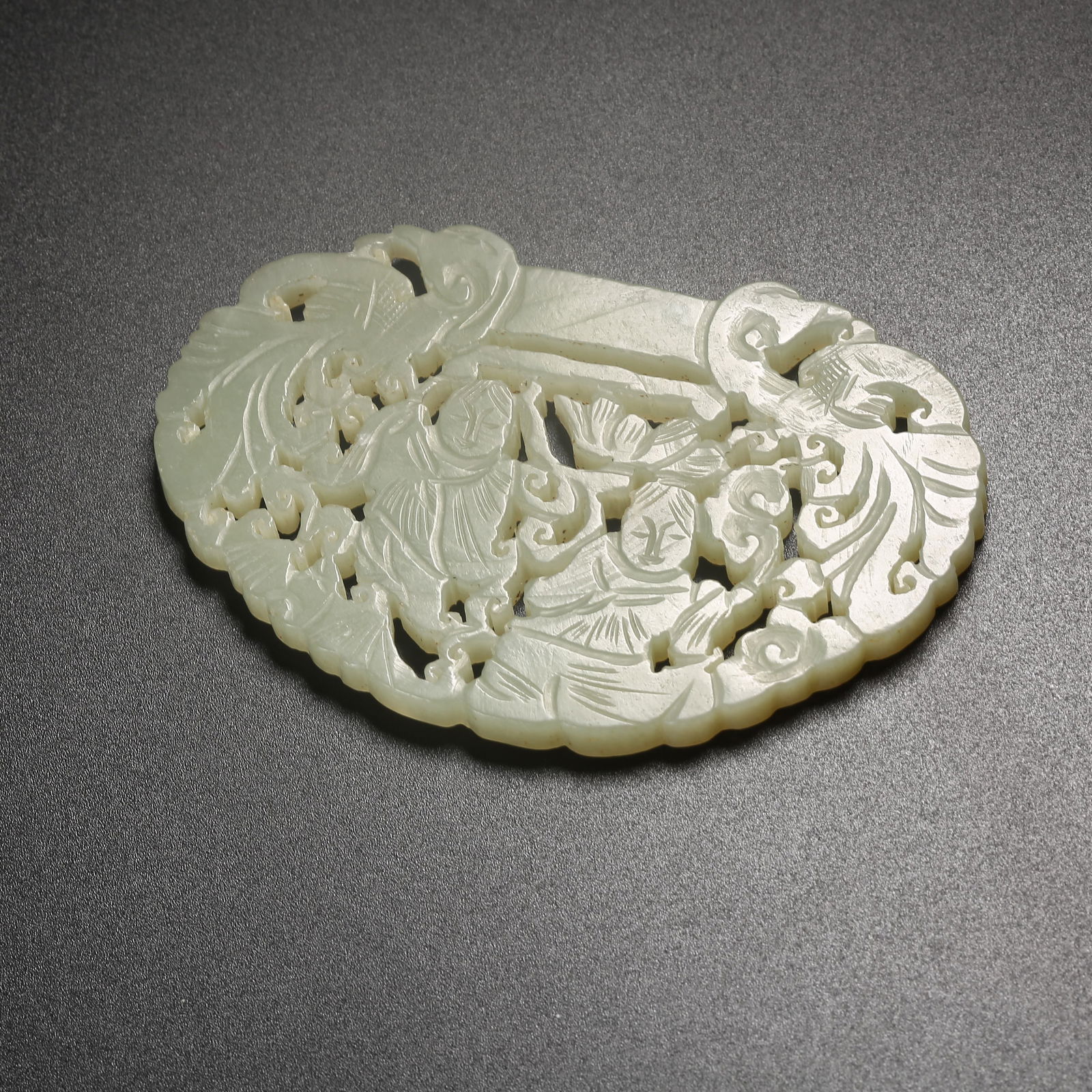 A HETIAN JADE LONGEVITY LOCK CARVED WITH THE HEHE TWINS MOTIF (1 of 9)