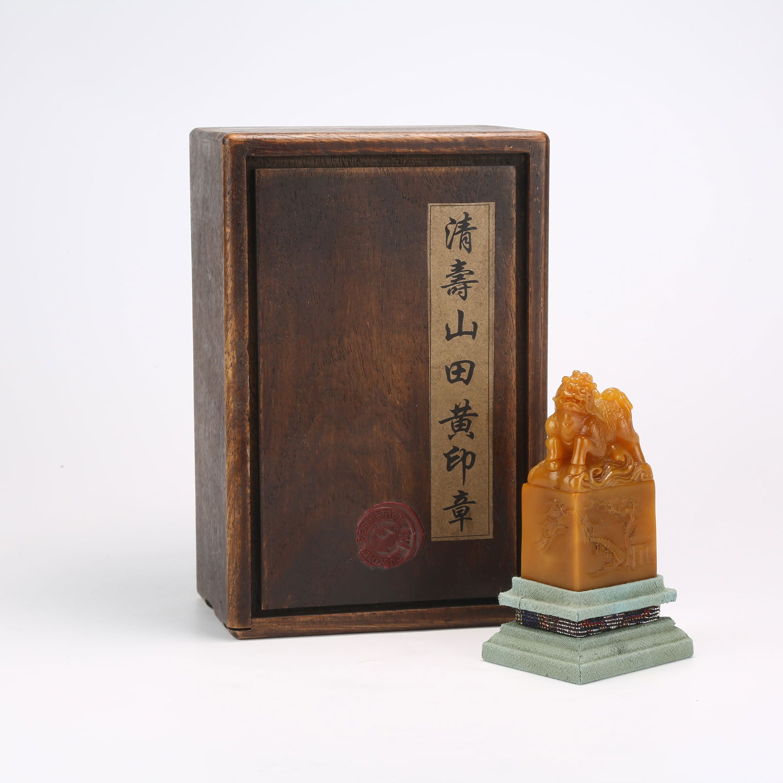 A SHOUSHAN TIANHUANG STONE SEAL WITH QILIN KNOB: Shoushan Tianhuang Stone Seal with Qilin Knob