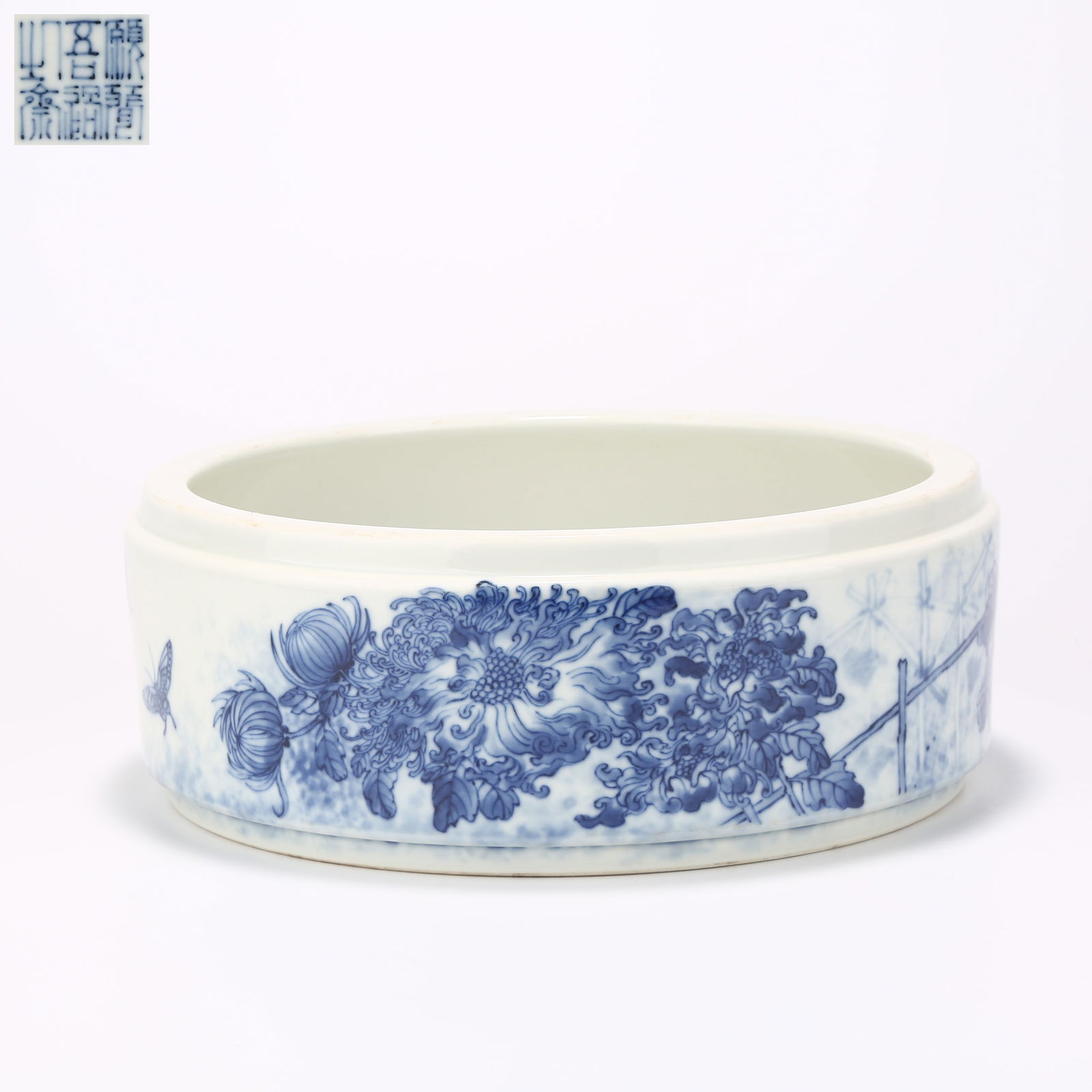 A BLUE-AND-WHITE WASHER WITH FLOWER AND BUTTERFLY DESIGN (1 of 9)