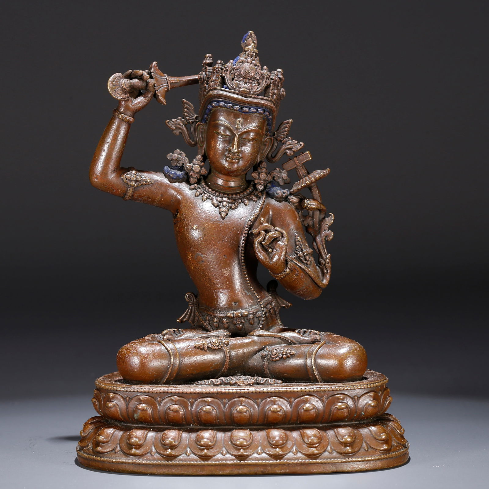 A BRONZE STATUE OF MANJUSHRI (1 of 9)