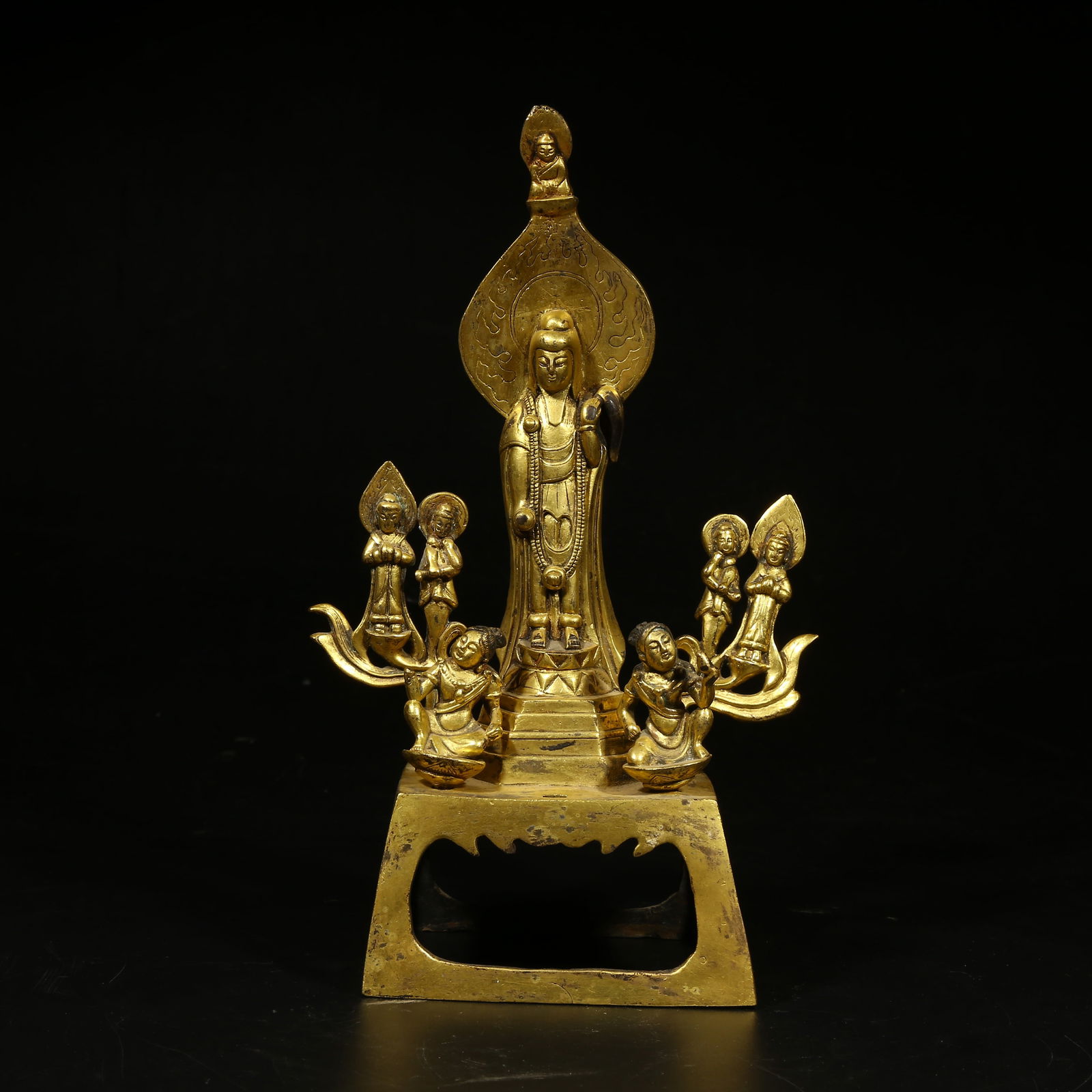 A GILT-BRONZE STANDING FIGURE OF GUANYIN: Gilt-Bronze Standing Figure of Guanyin