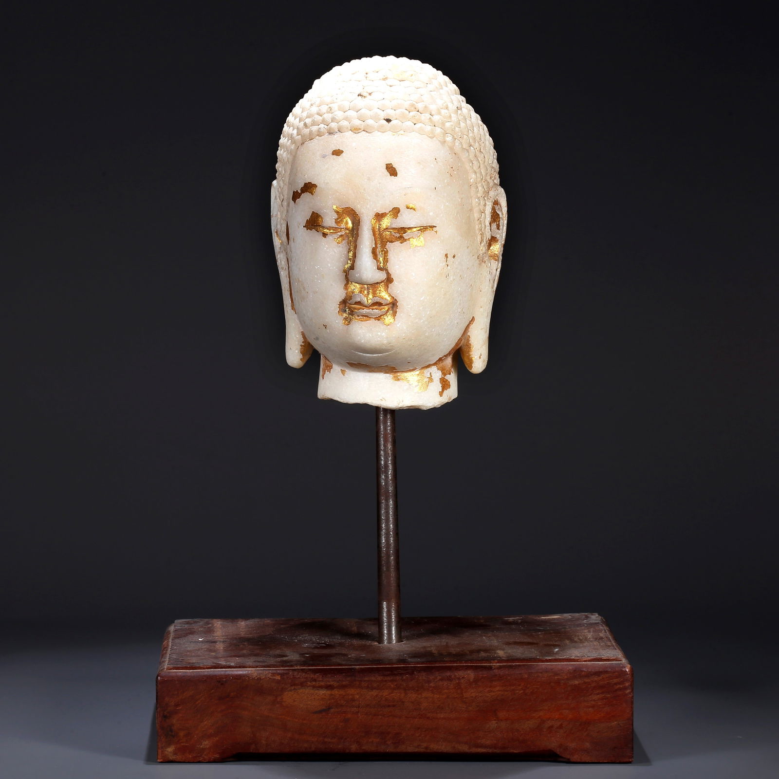 A CARVED HAN WHITE JADE BUDDHA HEAD (1 of 10)