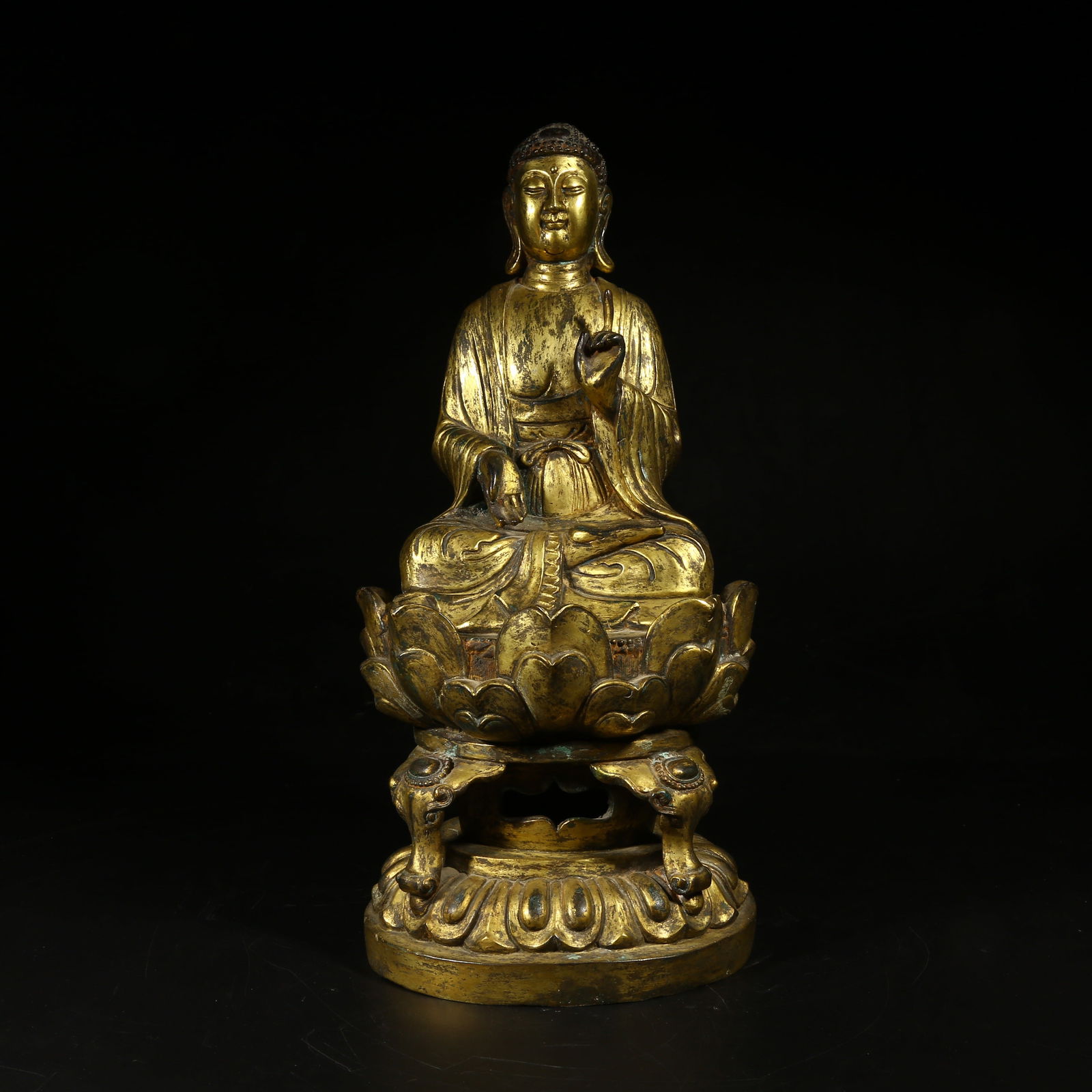 A GILT-BRONZE FIGURE OF SHAKYAMUNI BUDDHA (1 of 8)