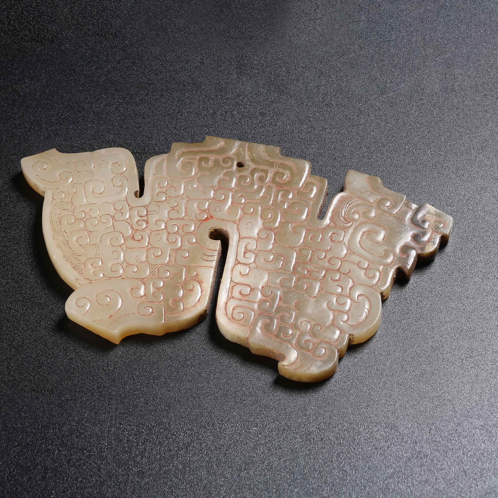 A ARCHAIC JADE S-SHAPED DRAGON PENDANT (1 of 8)