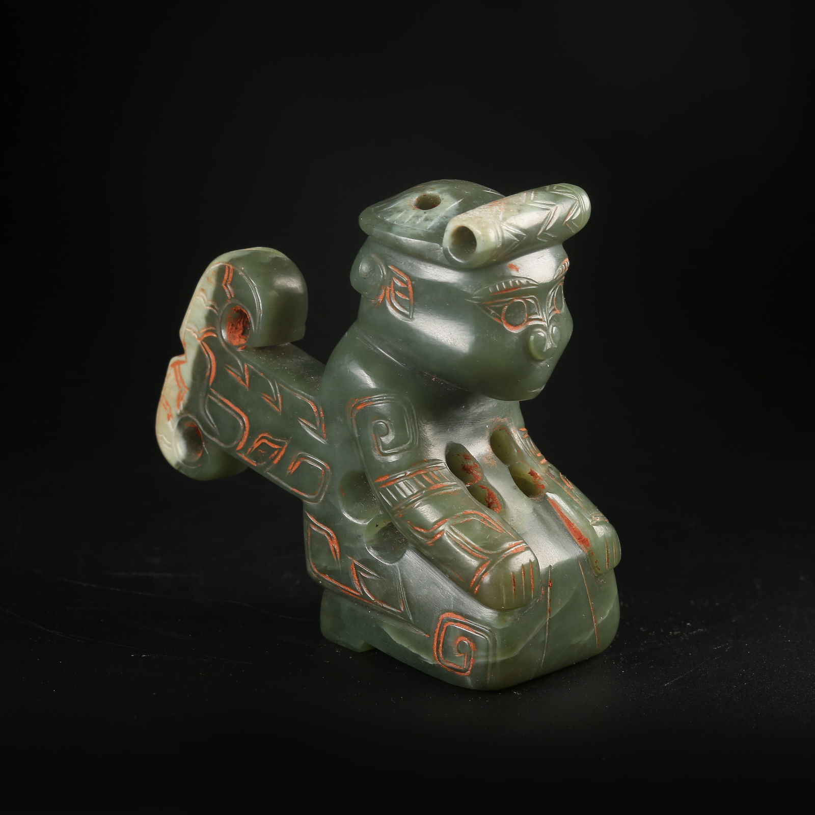 A ARCHAIC JADE KNEELING FIGURE (1 of 8)